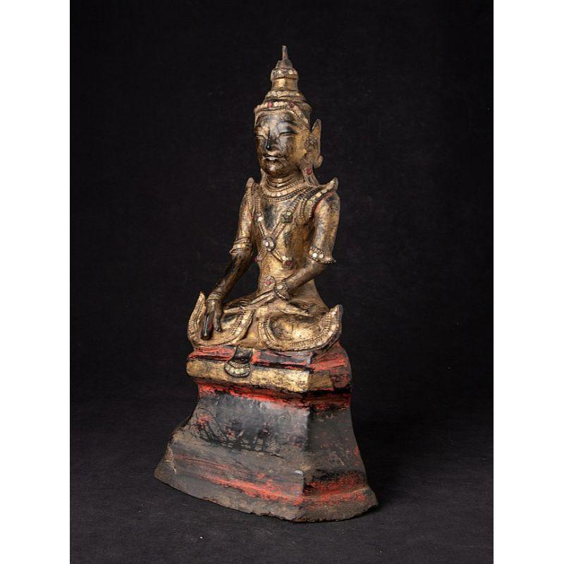 Material: lacquerware
36 cm high 
20,5 cm wide and 13,4 cm deep
Weight: 0.459 kgs
With traces of 24 krt. gilding
Shan (Tai Yai) style
Bhumisparsha mudra
Originating from Burma
Early 19th century.

