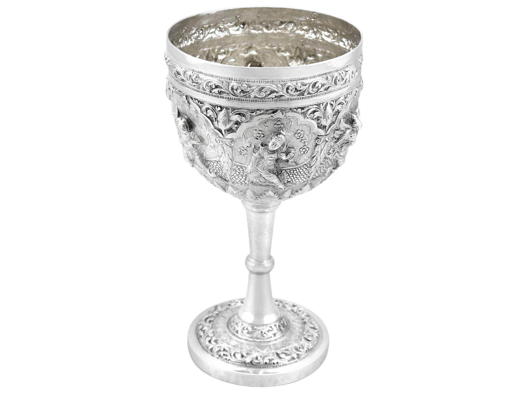An exceptional, fine and impressive antique Burmese silver goblet; an addition to our wine and drinks related silverware collection.

This exceptional antique Burmese silver goblet has a circular bell shaped form, to a knopped stem and circular