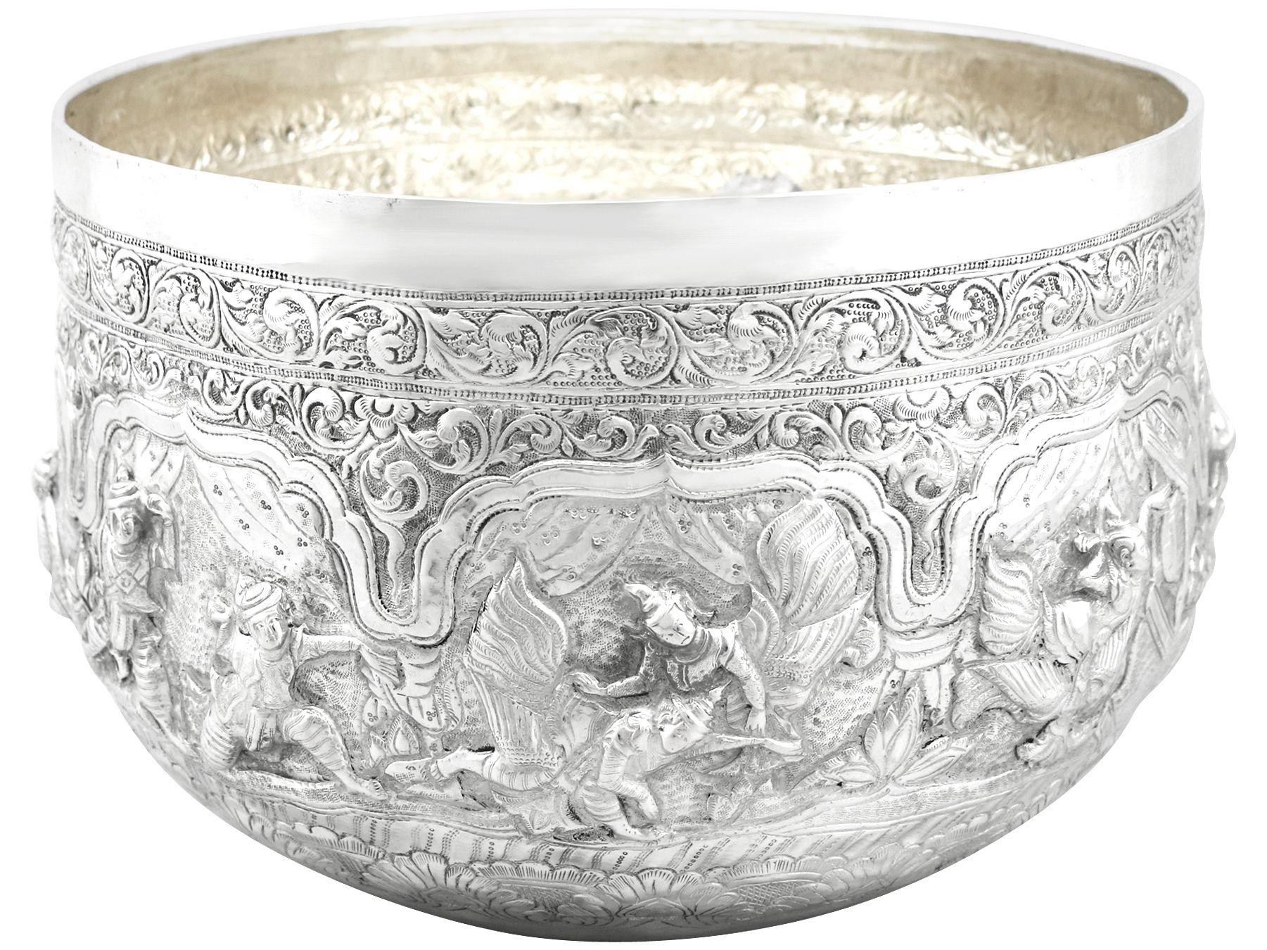 An exceptional, fine and impressive antique Burmese silver thabeik bowl; an addition to our ornamental silverware collection.

This exceptional antique Burmese thabeik silver bowl has a circular rounded form.

The surface of the bowl is