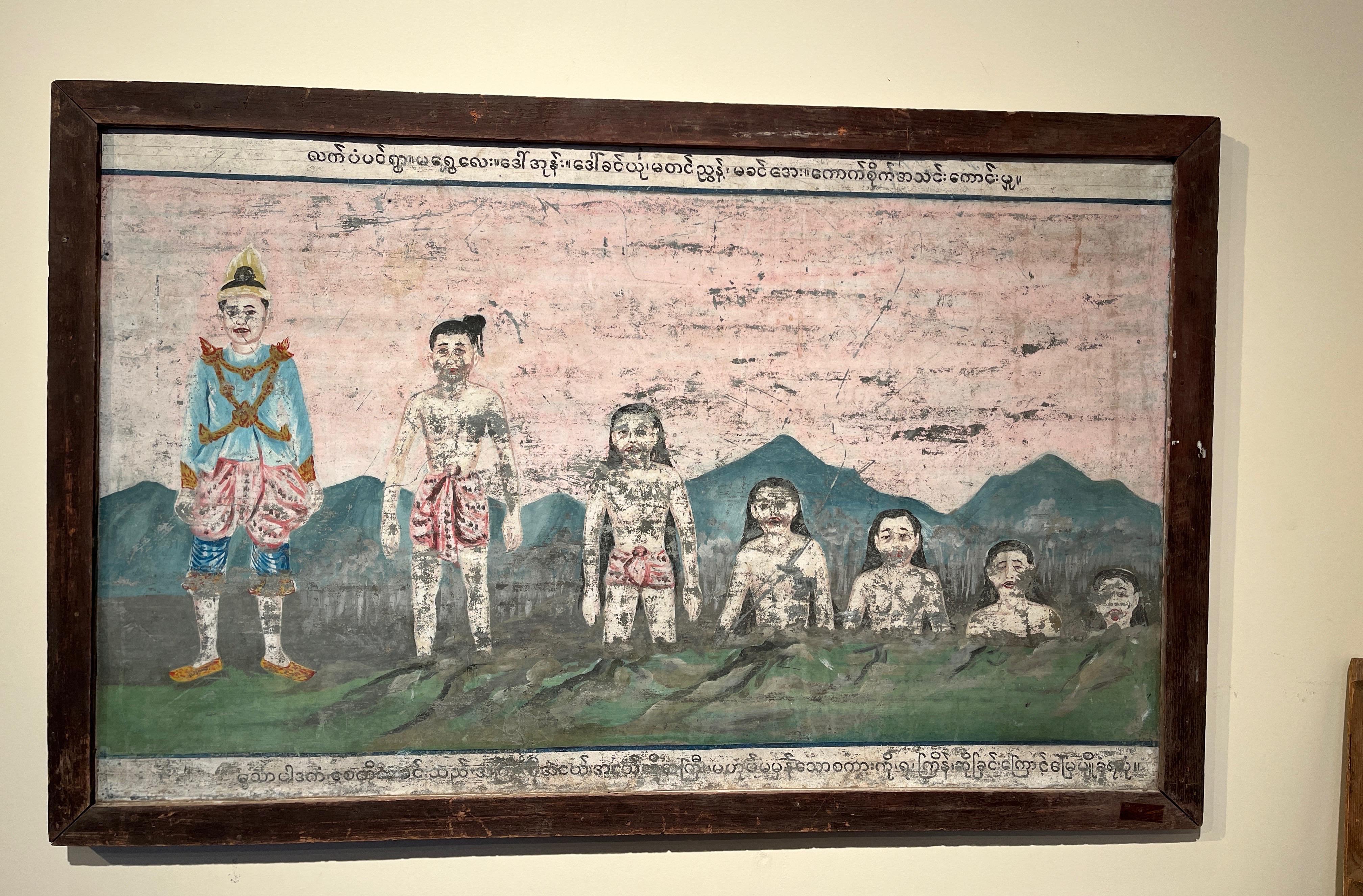 A large, beautiful and very unusual antique Burmese temple painting on tin. This Buddhist painting displays seven figures against a stunning background of worn and naturally faded pink and green paint. A simply framed piece that virtually glows on