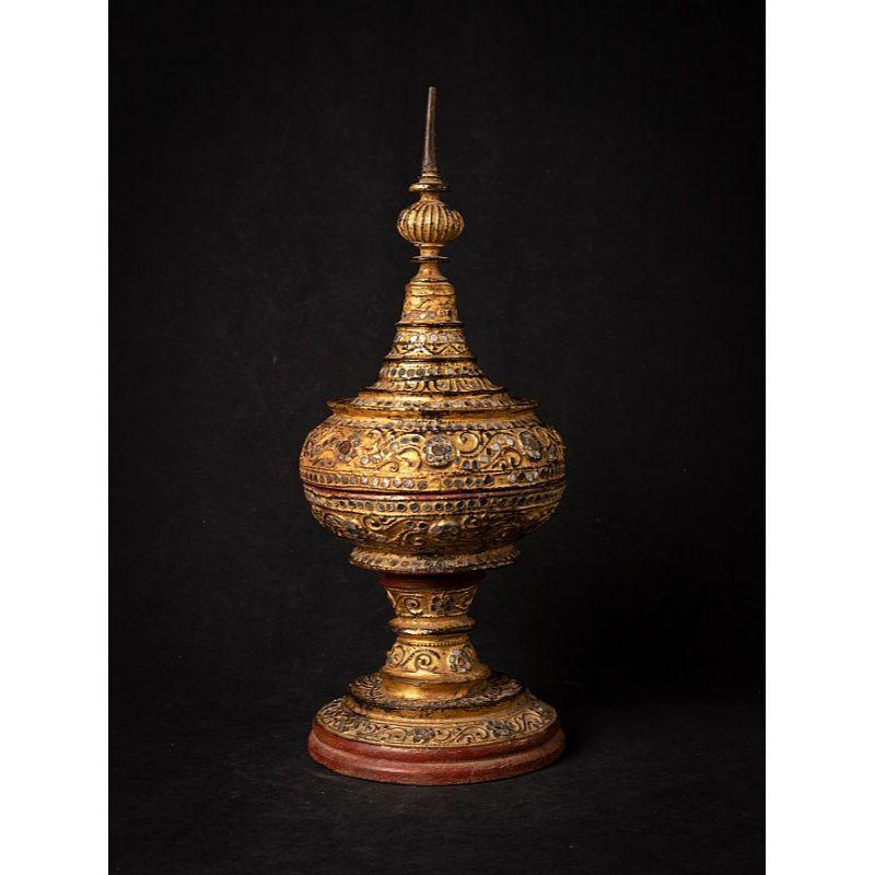Material: wood
45 cm high 
18 cm diameter
Weight: 1.061 kgs
Gilded with 24 krt. gold
Mandalay style
Originating from Burma
19th century

