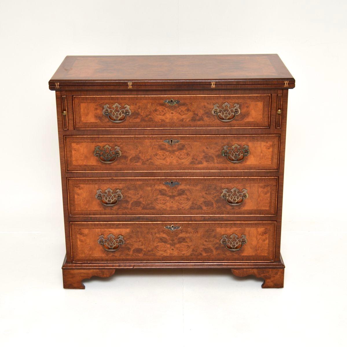 A beautiful and very well made antique burr walnut bachelors chest of drawers. This was made in England, it dates from around the 1950’s.

It is of superb quality and is a great size, with lots of storage space. There are gorgeous burr walnut grain