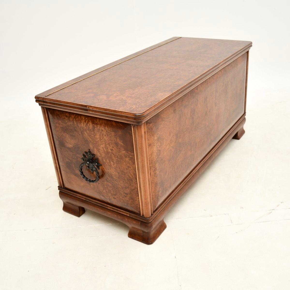A beautiful and unusual antique burr walnut blanket chest / trunk. This was made in England, it dates from around the 1950’s.

It is of superb quality, with absolutely gorgeous burr walnut grain patterns. The front & side of this trunk has raised
