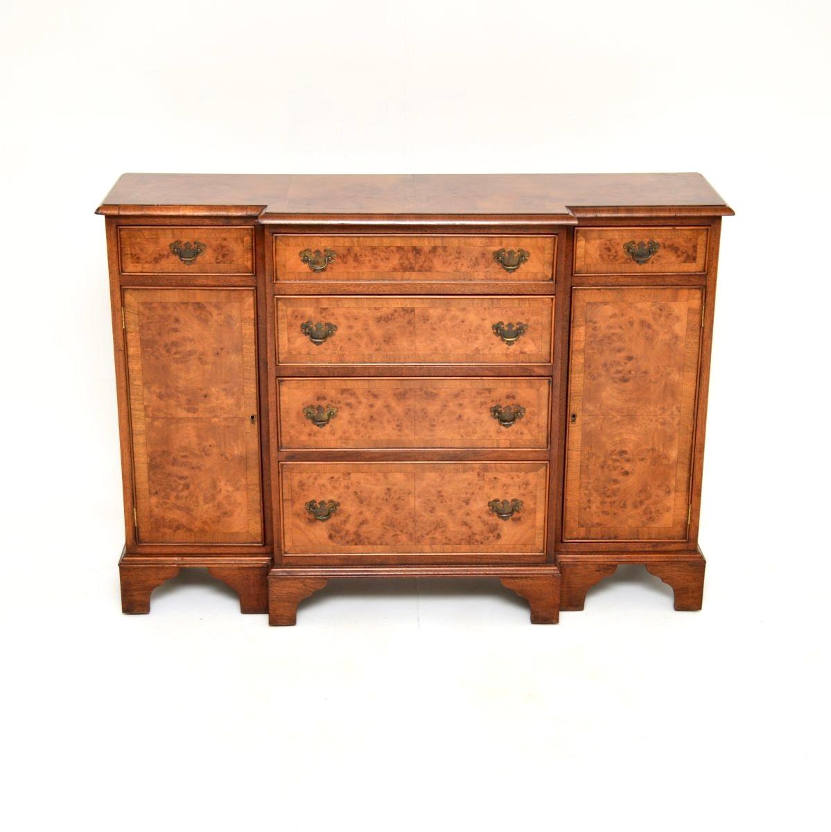 A compact and beautifully made antique burr walnut breakfront sideboard. This was made in England, it dates from around the 1900-1920 period.

It is a very useful size and has a very smart design. The quality is superb, with gorgeous burr walnut