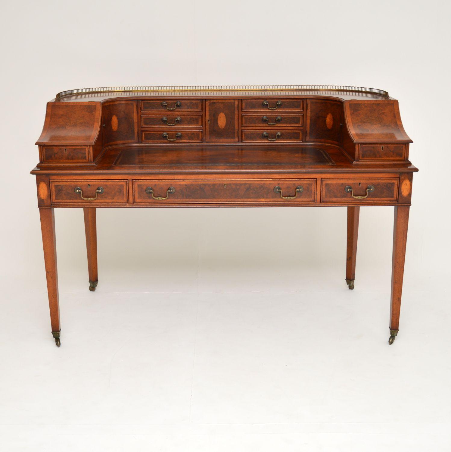 Large antique burr walnut Carlton House desk of exceptional quality, with fabulous details & full of character. I don’t think I’ve come across a burr walnut one before & this one has many fine satinwood inlays.

It has the typical Carlton House