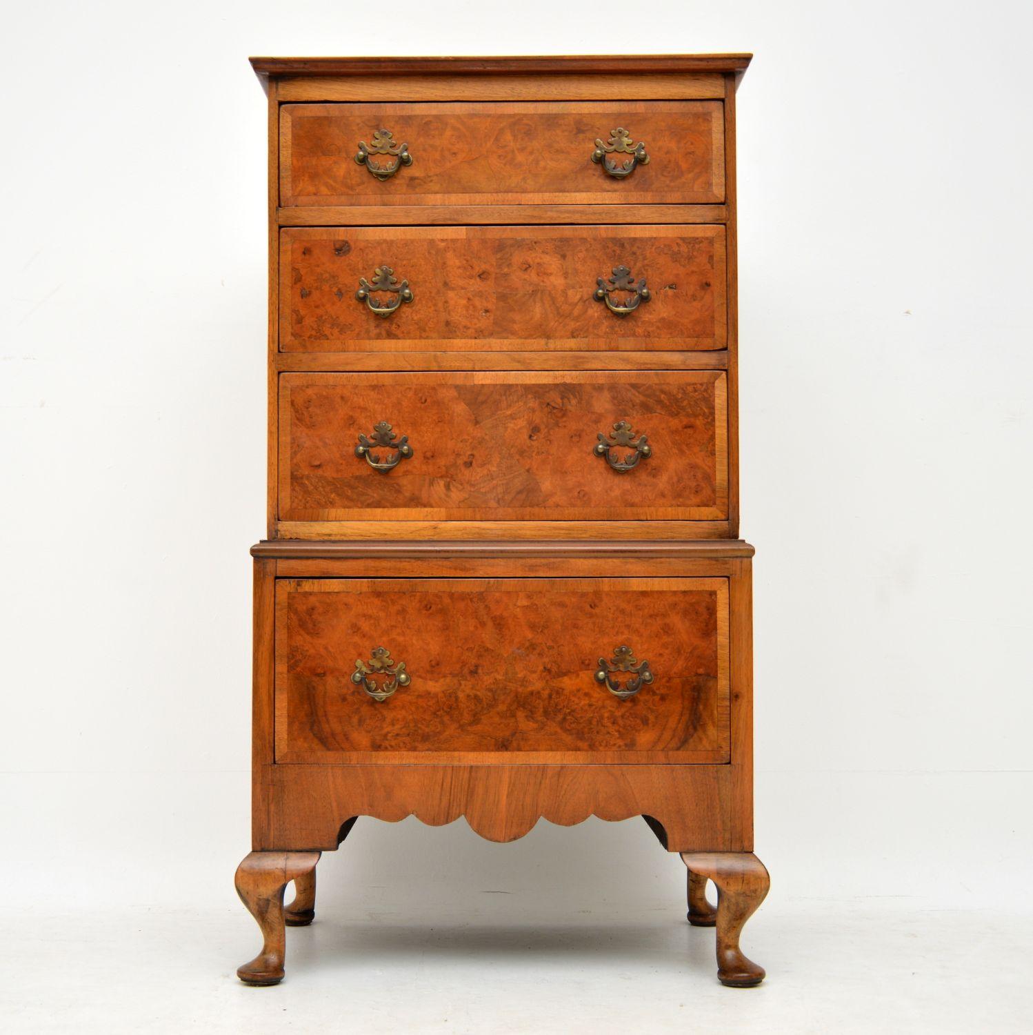 Antique burr walnut chest on chest of small proportions & of high quality. It’s Queen Anne style & dates from circa 1910 period. The top is burr walnut with a figured walnut cross banding, while the drawer fronts are the same. The drawers are