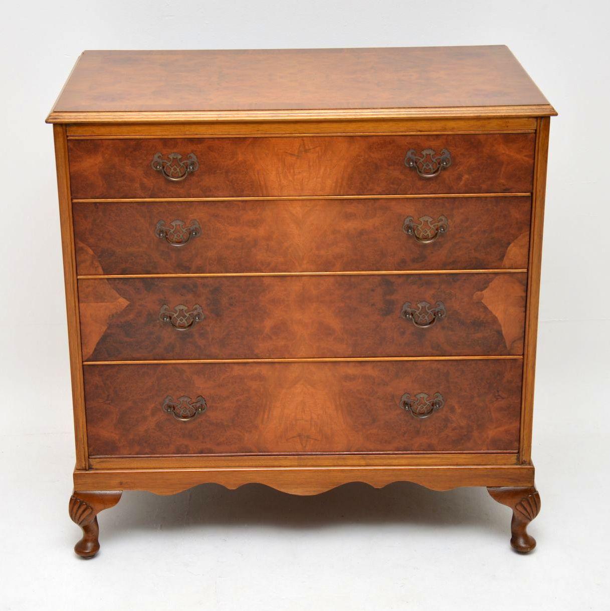 This antique chest of drawers has a burr walnut top and front section, with cross banding on the top. The burr walnut shows a lovely pattern running down all the drawers which are graduated in depth and have original brass handles. This chest is in
