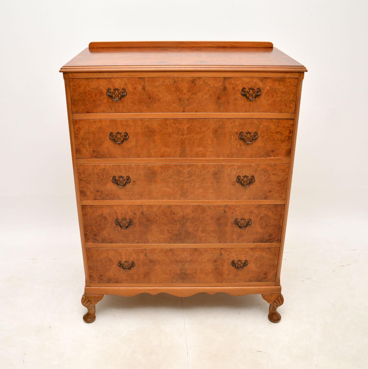 A beautiful antique burr walnut chest of drawers in the Queen Anne style. This was made in England, it dates from around the 1930’s.

The quality is fantastic, this is a very useful size with lots of storage space. The burr walnut grain patterns and