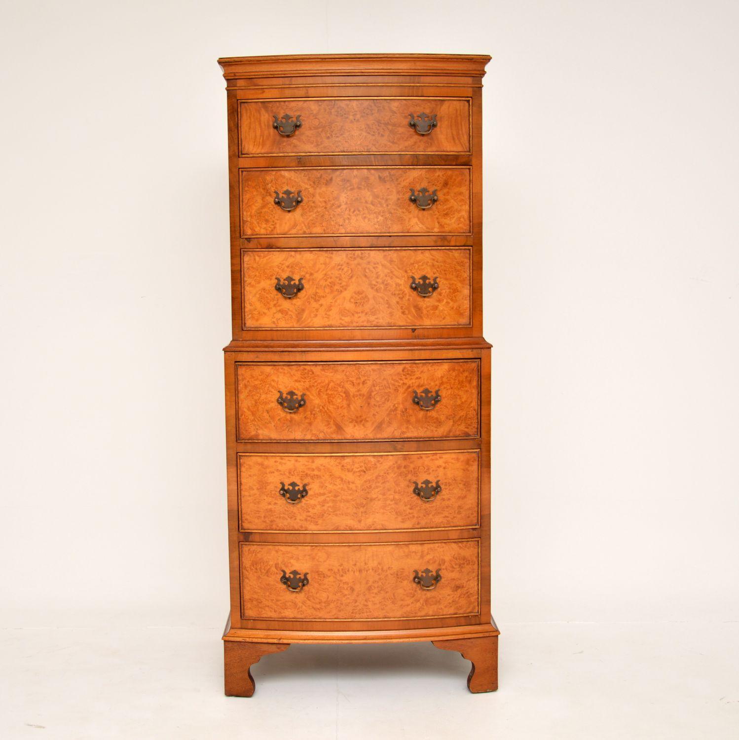 A beautiful antique burr walnut chest on chest of drawers. This was made in England, it dates from around the 1930’s.

It is of super quality and is a great size. Tall and slim, it doesn’t take up much floor space yet has plenty of storage space