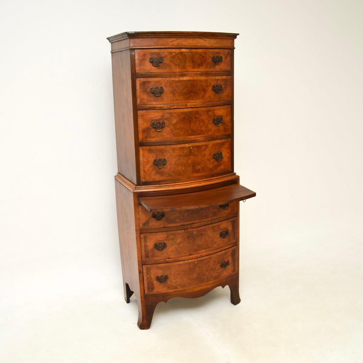 A stunning antique burr walnut chest on chest of drawers. This was made in England, it dates from around the 1890-1910 period.

The quality is superb, this is a great size and offers lots of storage space. It has a bow shaped front, with a pull out