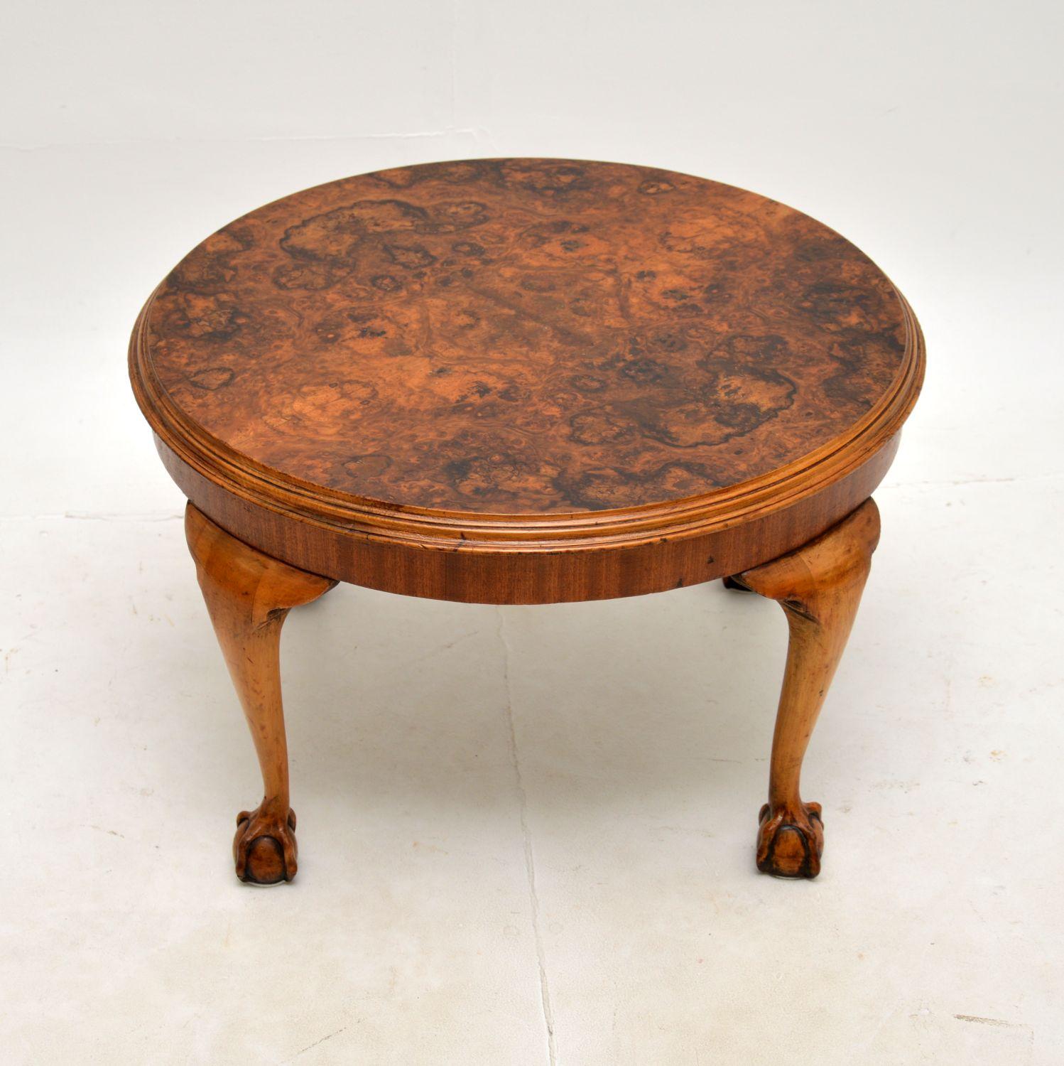 A wonderful antique burr walnut coffee table, made in England and dating from the 1920-30’s.

It is of superb quality and is a very useful size. The circular top has absolutely gorgeous butt walnut grain patterns, this sits on cabriole legs