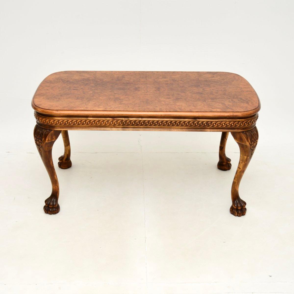 A beautiful and extremely well made antique burr walnut coffee table in the Queen Anne style. This was made in England, it dates from around the 1930’s.

The quality is outstanding, this is a large and impressive size. The top has stunning burr