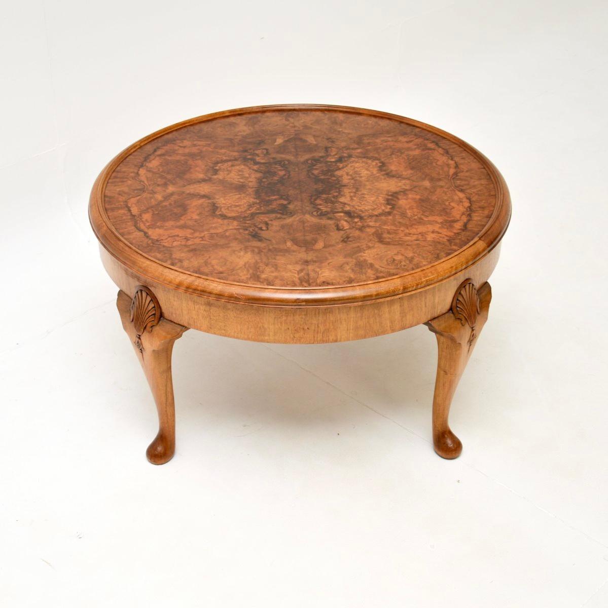 A quite large and beautifully crafted antique burr walnut coffee table. This was made in England, it dates from around the 1920-30’s.

The quality is outstanding, the circular top has a raised edge and has stunning burr walnut grain patterns. It