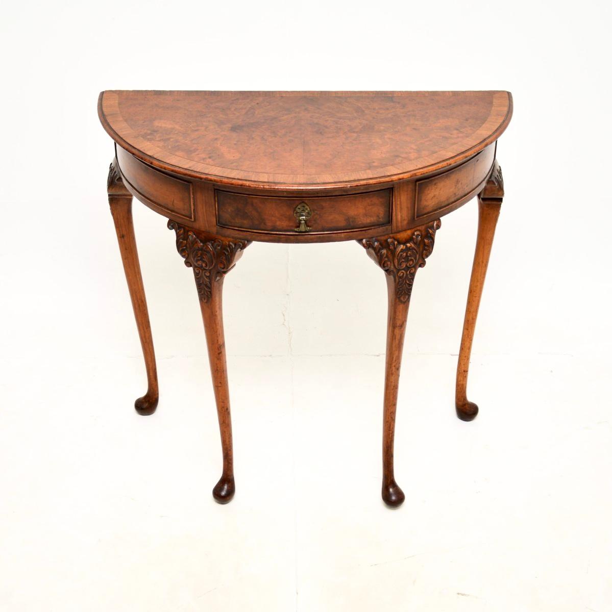 A wonderful antique burr walnut console side table. This was made in England, we would date it from around the 1890-1900 period though it could possibly be a bit earlier.

The quality is outstanding, this is extremely well made with a lovely and