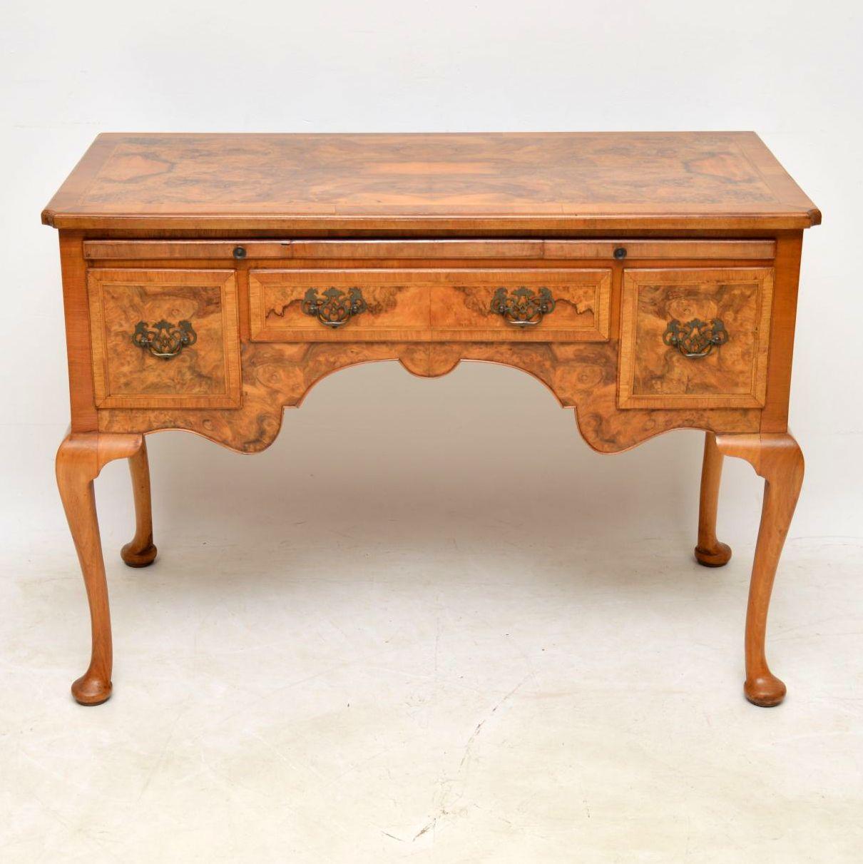 This antique burr walnut desk, side table or dressing table is of very high quality and is a very functional piece of furniture. It’s in excellent condition, with a great colour and dates to circa 1890-1910 period. The top and front has fabulous
