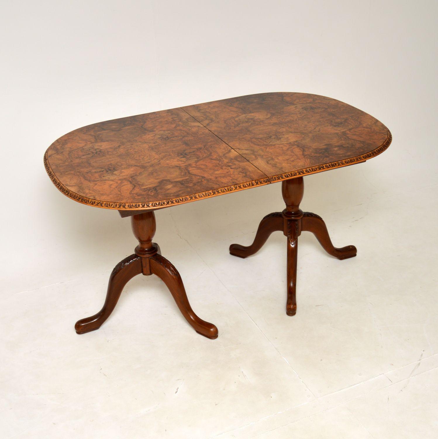 A gorgeous antique burr walnut extending dining table. This was made in England, it dates from around the 1920-30’s.

It is of superb quality, the top has beautifully carved edges and absolutely stunning burr walnut grain patterns. This sits on a