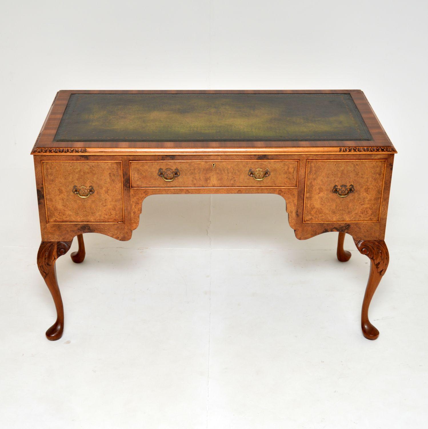 A beautiful antique burr walnut desk on legs. This was made in England, it dates from around the 1920-1930’s period.

It is of extremely fine quality and is a useful size. There are stunning burr walnut grain patterns, the top is cross banded and