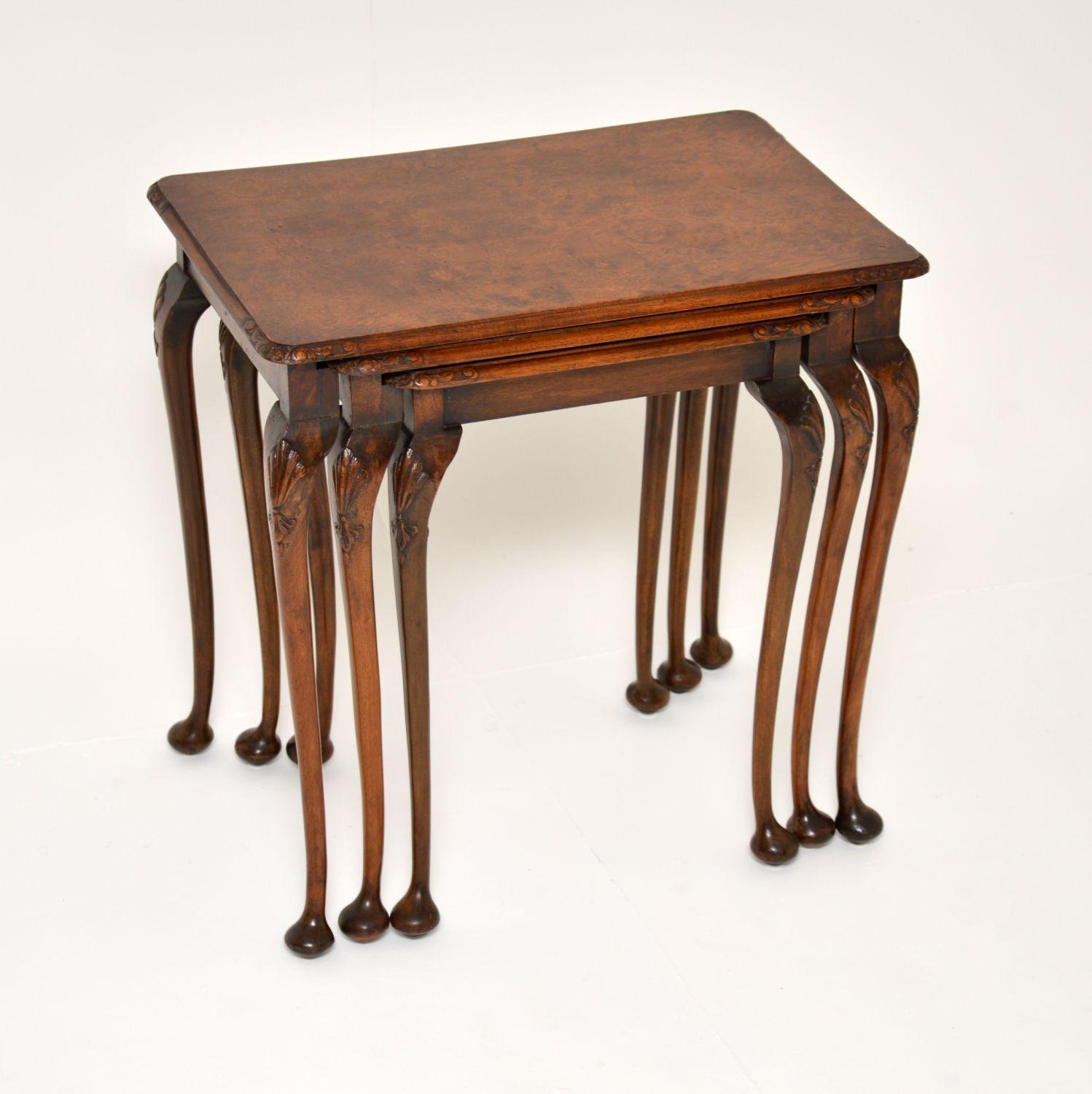 A beautiful and elegant set of three nesting tables in walnut. These were made in England, they date from around the 1920-1930’s period.

They are very well made and are of excellent quality. There is intricate floral carving on the top corners,