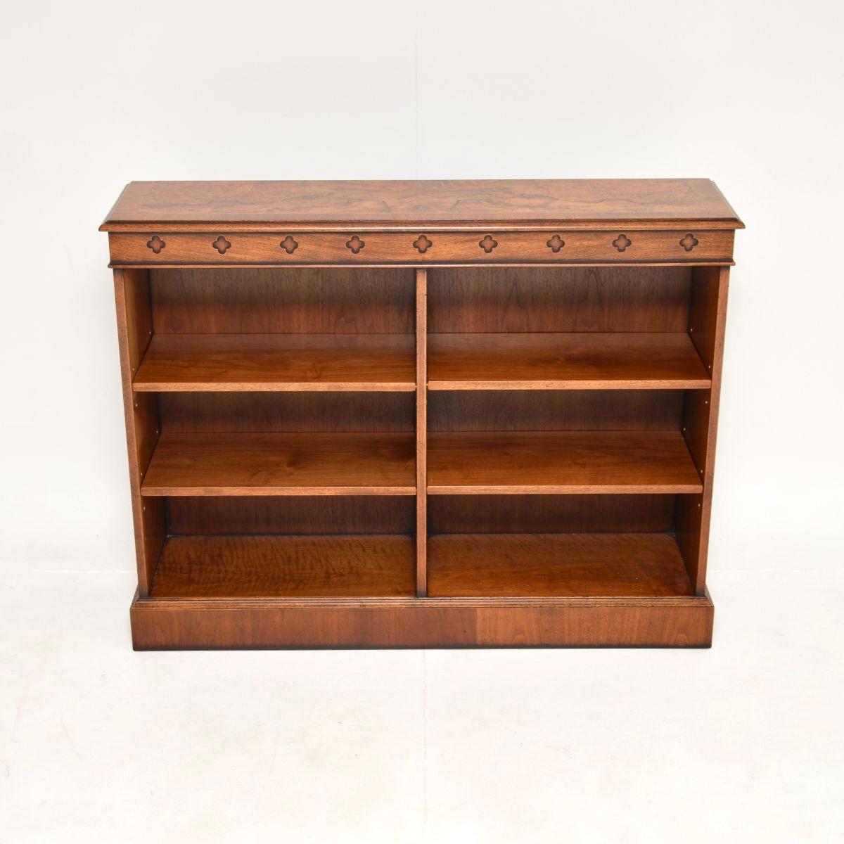 A lovely antique burr walnut open bookcase in the Victorian style. This was made in England, it dates from around the 1950’s.

The quality is outstanding, this is a great size with plenty of storage space. There are two sections with four adjustable