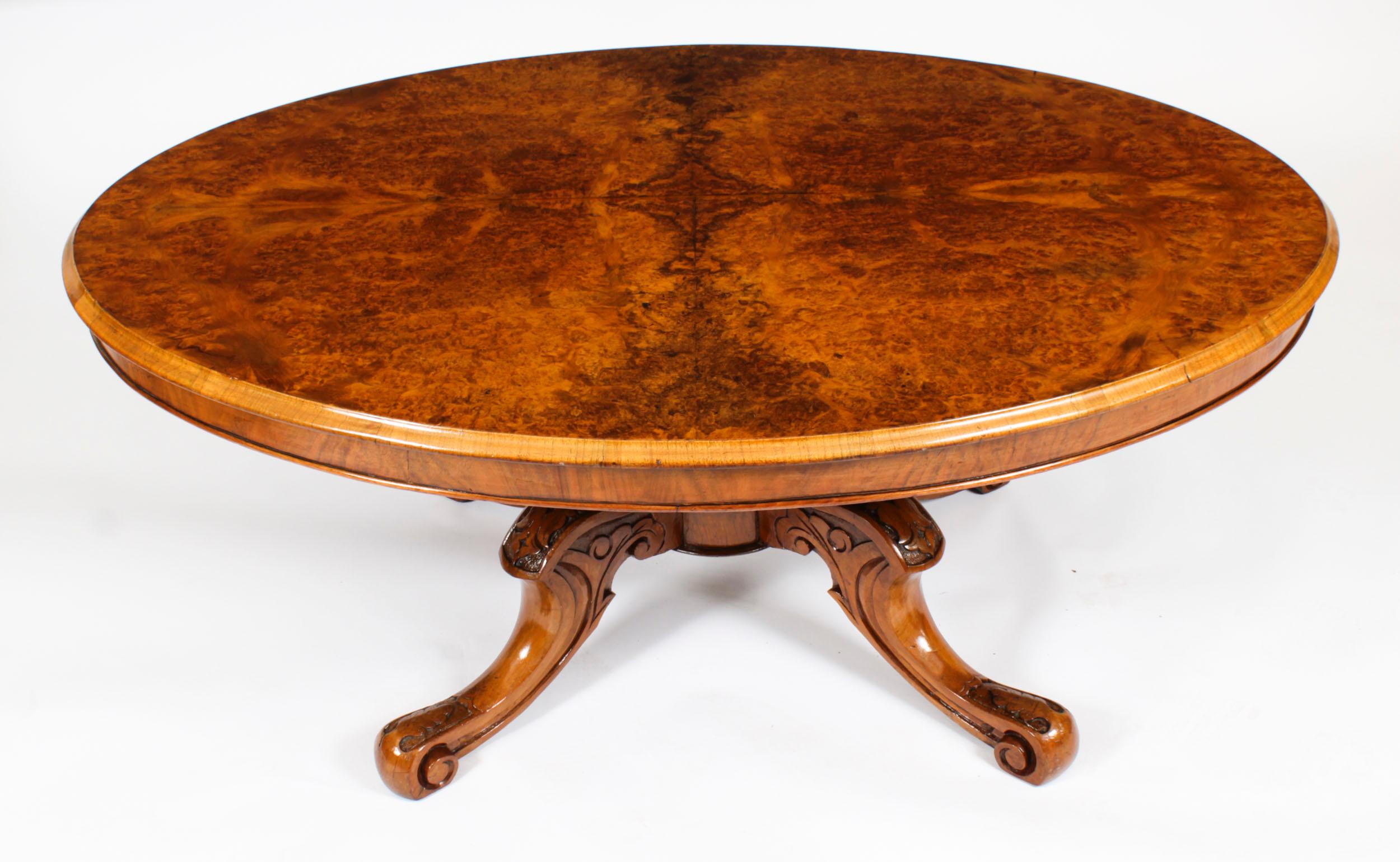 This is a lovely antique Victorian burr walnut coffee table, circa 1860 in date.

The oval table top features a beautifully figured ‘mirrored’ burr walnut veneer.

The base has been hand carved from solid walnut and stands on four cabriole legs with