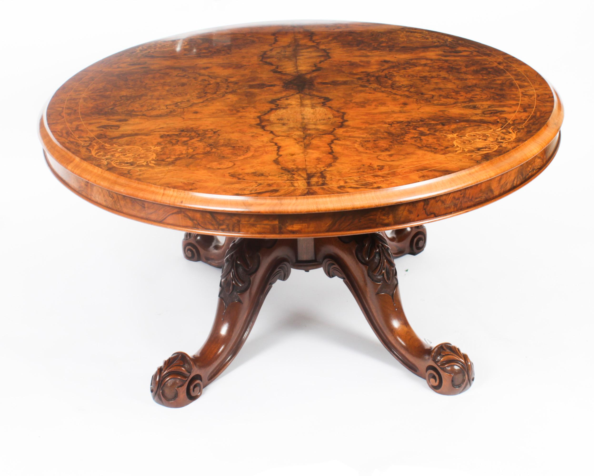 This is a lovely antique Victorian burr walnut and marquetry coffee table, circa 1860 in date

The oval moulded table top features beautiful inlaid marquetry decoration in a beautifully figured ‘mirrored’ walnut veneer.

The base has been hand