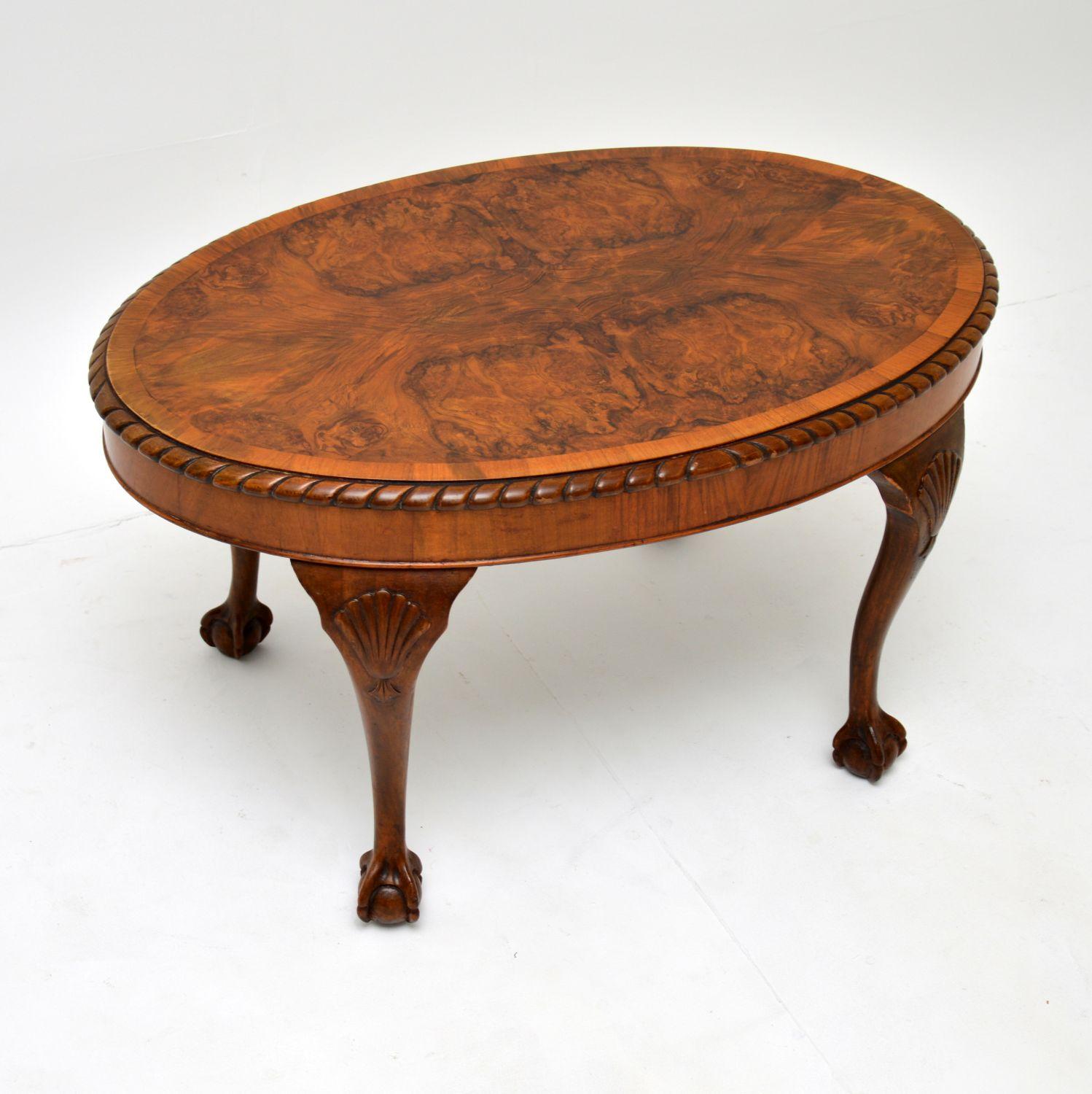 This gorgeous antique Queen Anne style coffee table is beautifully made from walnut and dates from around the 1900-1920 period.

It is of excellent quality and is a useful size. The top has spectacular burr walnut grain patterns, with a cross