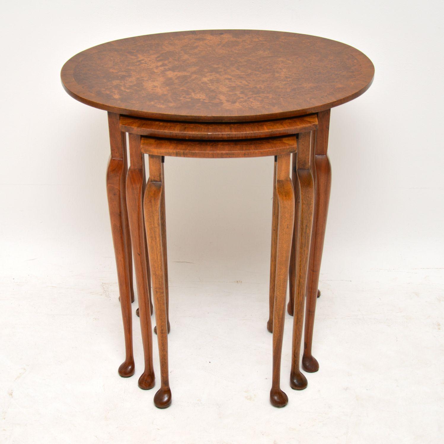 Antique burr walnut nest of tables dating from around the 1920s-1930s period and in excellent condition, having just been French polished. The table tops are a tight burr walnut with cross banded edges and they sit on Queen Anne legs.

Measures:
