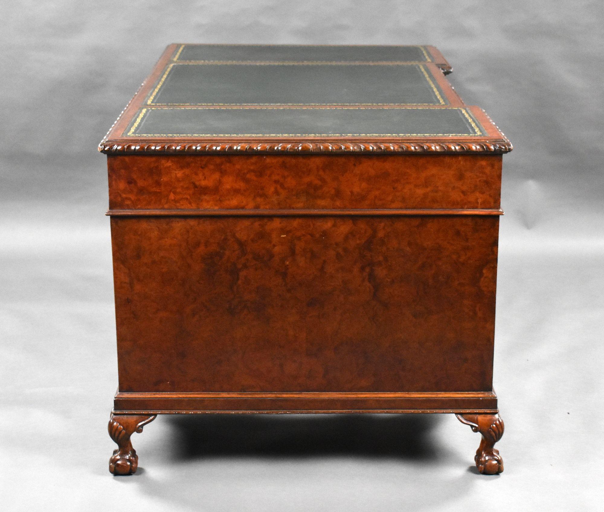 For sale is a good quality antique burr walnut pedestal desk, the top having three leather skiver inserts, each decorated with gold tooling, with three drawers below. The top fits on to two pedestals, each with a further three drawers. The desk is