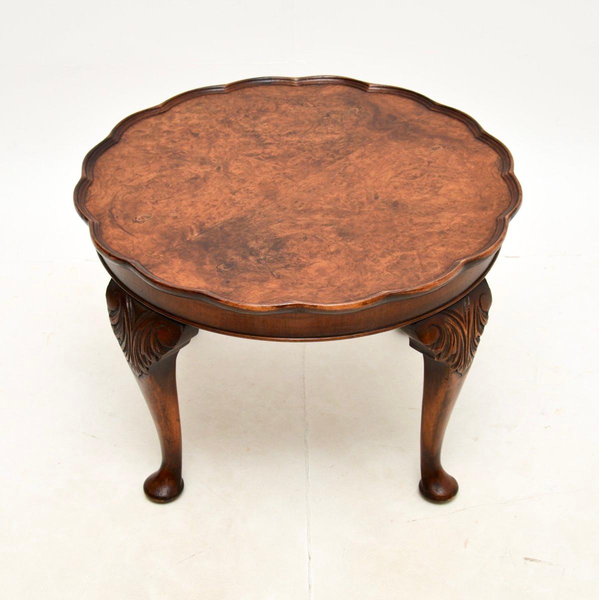 A lovely antique burr walnut pie crust coffee table. This was made in England, it dates from the 1920-30’s.

It is of very good quality and is a very useful size. The top has stunning burr walnut grain patterns, this sits on sturdy and shapely