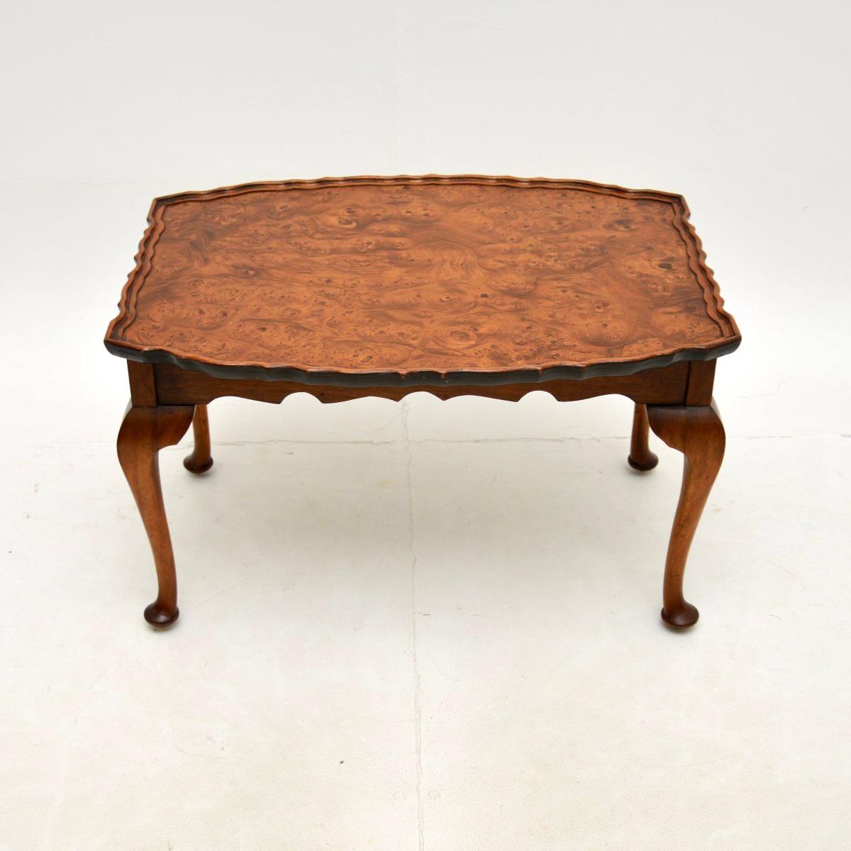 A beautiful antique burr walnut pie crust coffee table. This was made in England, it dates from around the 1930’s.

It is a lovely size and is of great quality. The top has a raised pie crust edge and wonderful burr walnut grain patterns. This sits