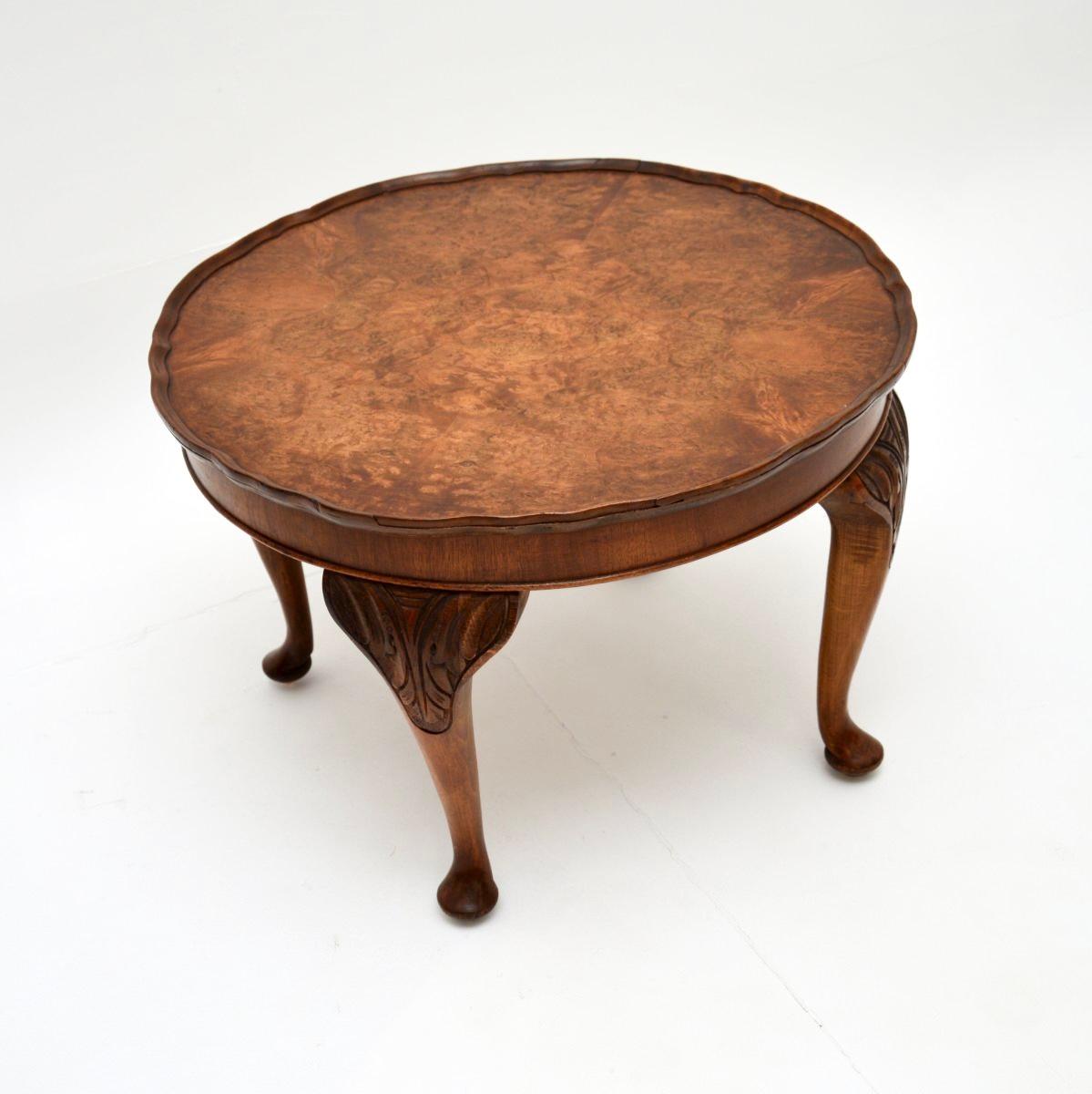 A lovely antique burr walnut pie crust coffee table. This was made in England, it dates from around the 1930’s.

It is of very good quality and is a very useful size. The circular top has stunning burr walnut grain patterns, this sits on sturdy and