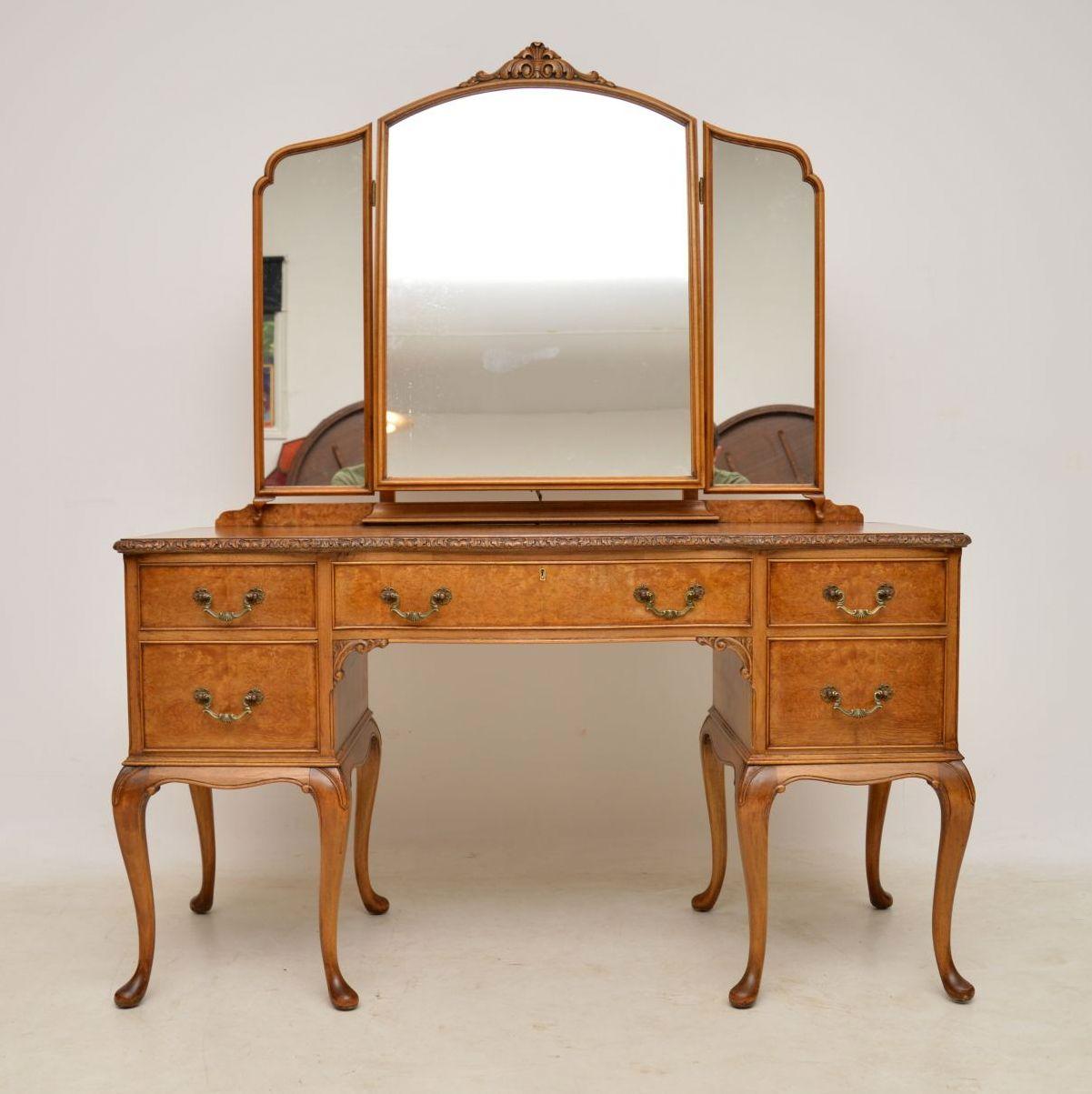 These antique dressing tables are becoming very hard to find these days & they seem to be very popular. This one is a great model & is in excellent condition having just been re-polished. It’s burr maple & walnut, with triple adjustable mirrors,