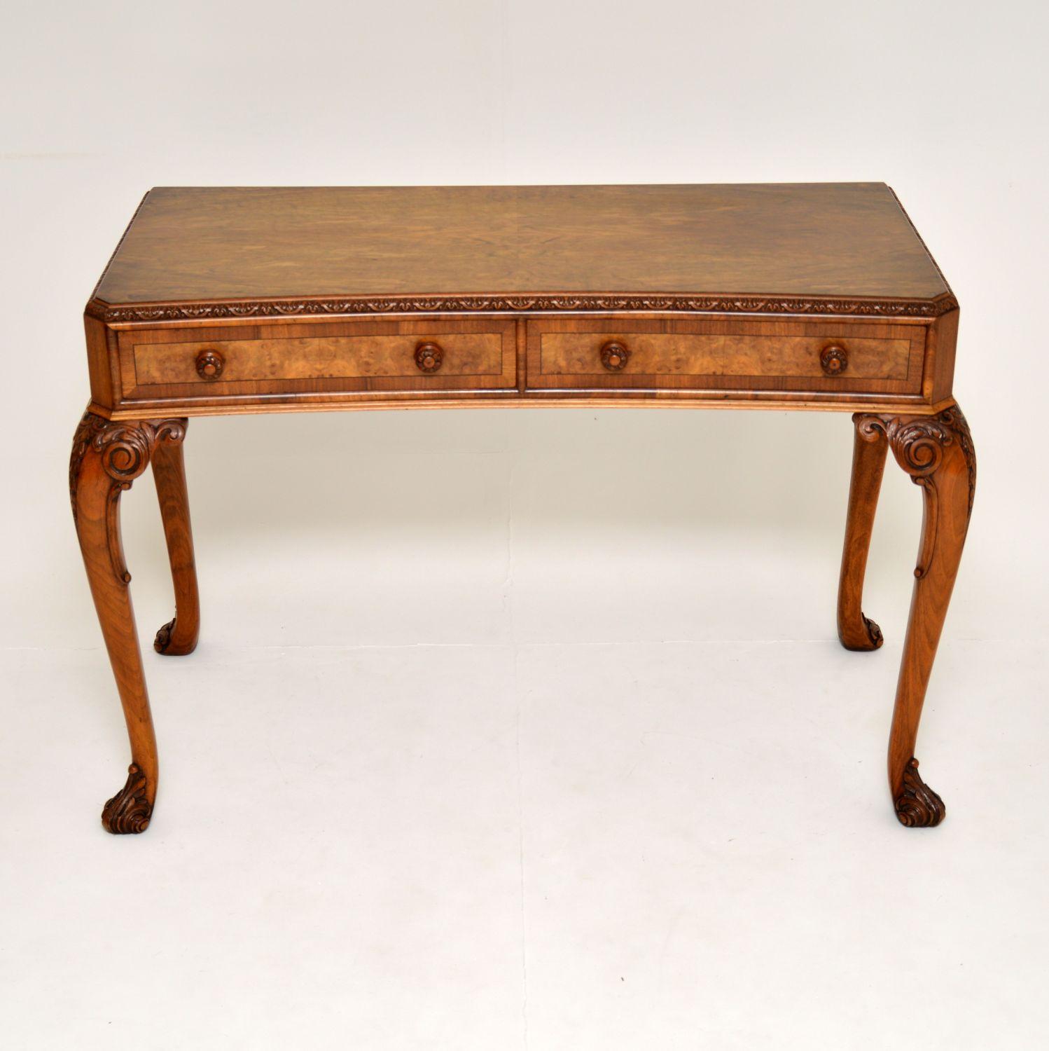 A stunning antique side table of superb quality, with a concave shaped front and canted corners, beautifully made from solid and burr walnut. This dates from circa 1900-1920 period.

It is large and so well made, with fine quality and very deep