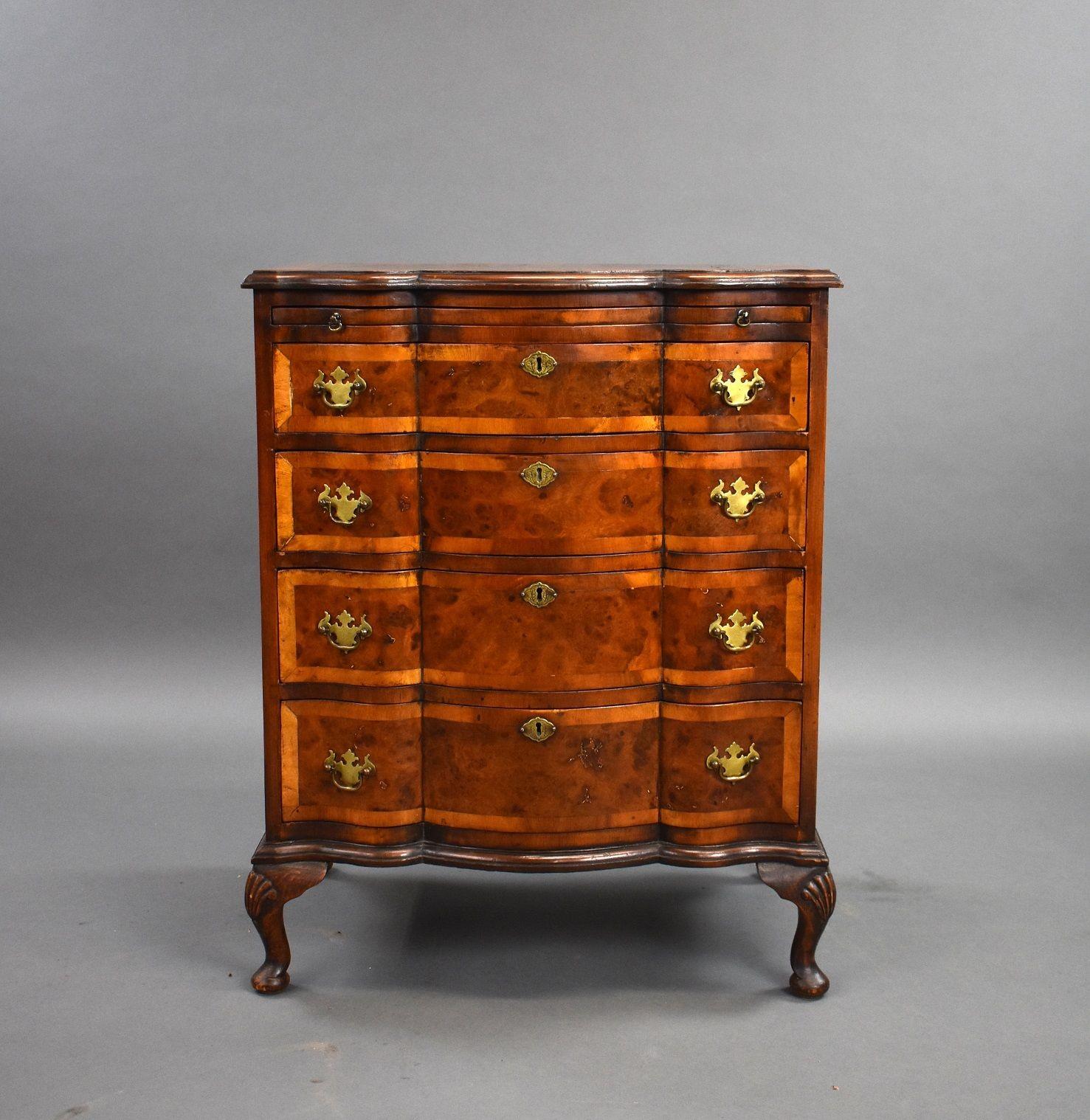 19th Century Burr Walut batchelors chest drawers in good condition with writing slide above four drawers with brass handles and escucheons, all drawers are oak lined and stands on small elegant cabriole legs