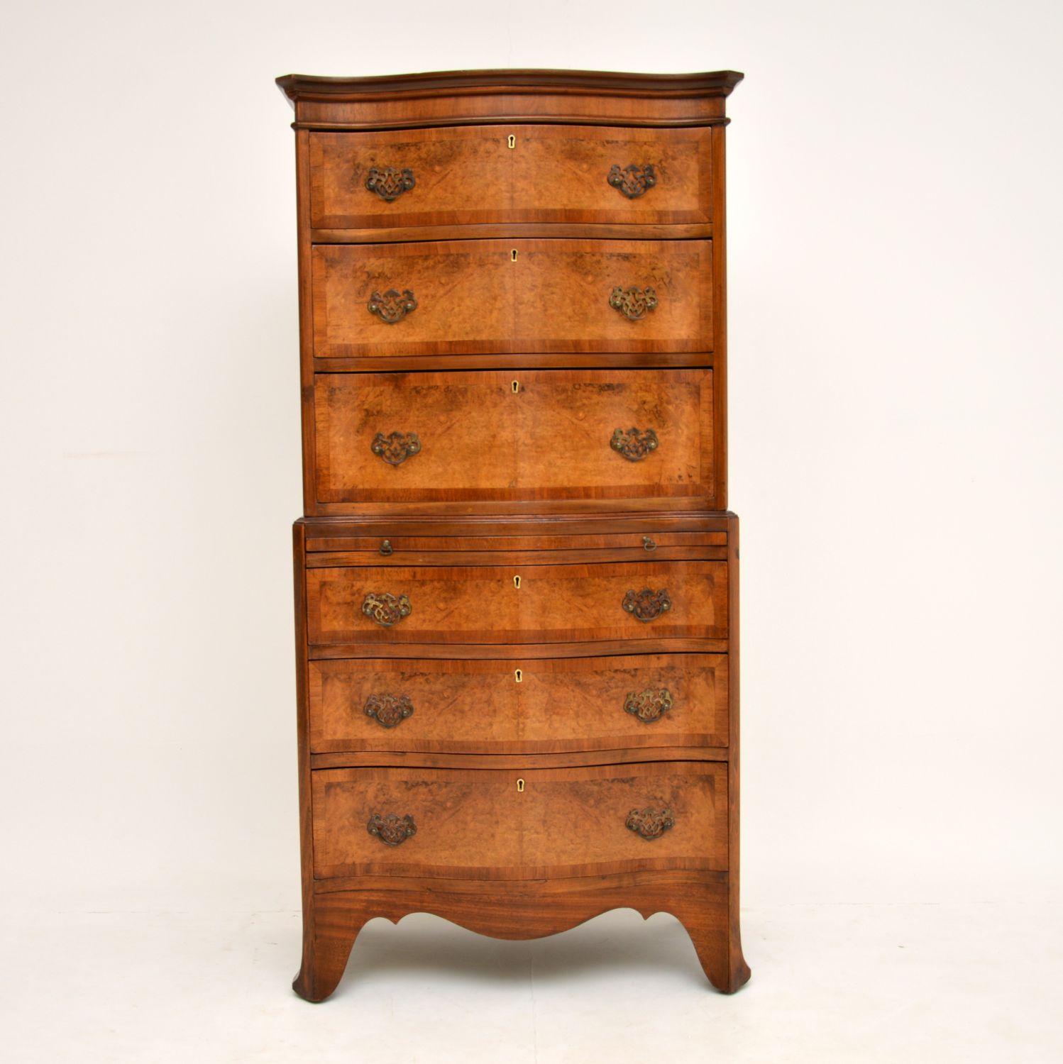 A stunning antique burr walnut chest on chest with a serpentine shaped front and canted corners. This is in the Classic Georgian style, it dates from circa 1890-1910 period.

The quality is amazing and this has beautiful burr walnut veneers, all