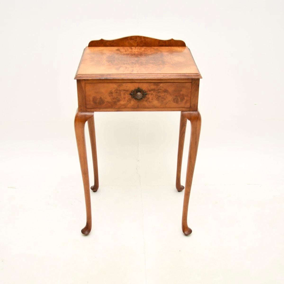 A beautiful antique burr walnut side table, made in England and dating from around the 1900-1910 period.

It is of amazing quality and is a very useful size, perfect for use as an occasional lamp table or even as a bedside table. There are gorgeous