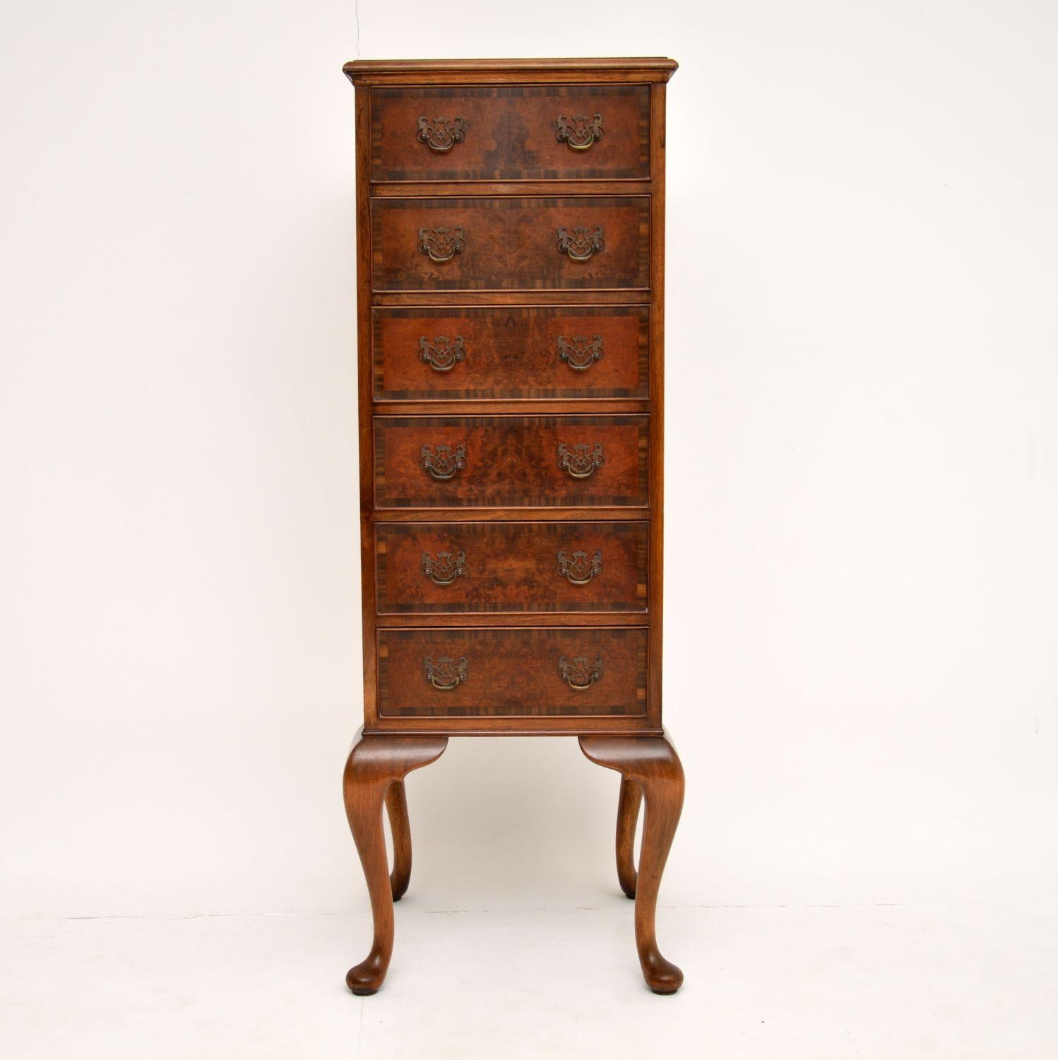 A beautiful antique tall slim chest of drawers in burr walnut, sitting on solid walnut cabriole legs. This dates from circa 1900-1920 period, it is of superb quality and in excellent condition.

We have just had this hand polished to a high