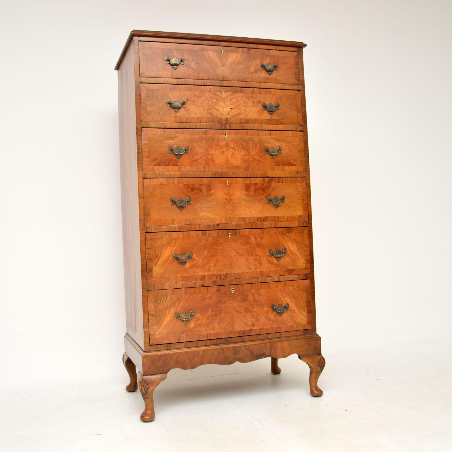 A superb antique tallboy chest of drawers in burr walnut. This was made in England, it dates from the 1900-1920 period.

It is of extremely high quality and offers lots of storage space in the six generous drawers that are graduated in depth. The
