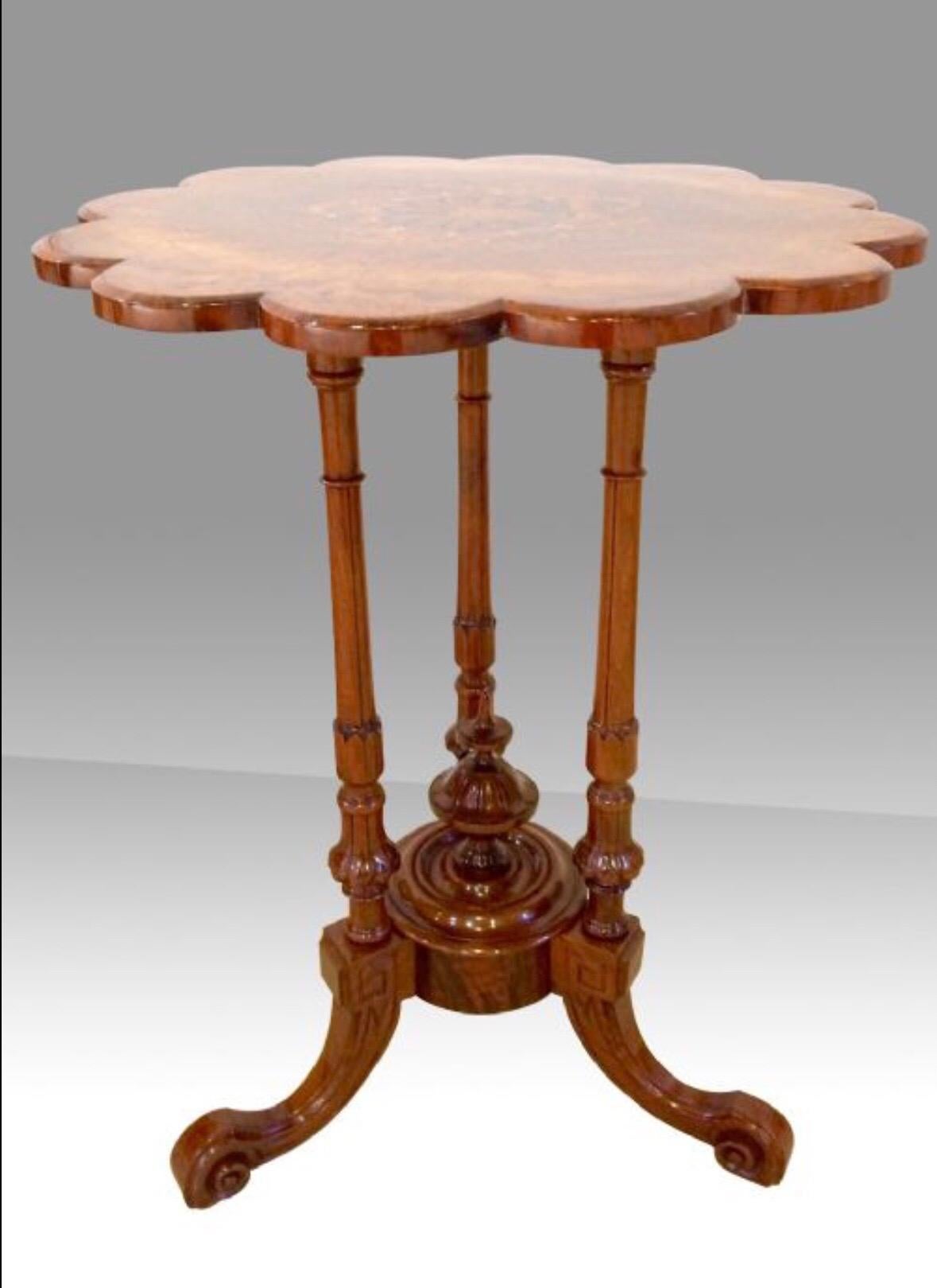 Stunning Victorian inlaid burr
Walnut antique wine, occasional, lamp table with
tri pillar base and shaped top
c1860
Measures: 27 ins high x 21 ins diameter.