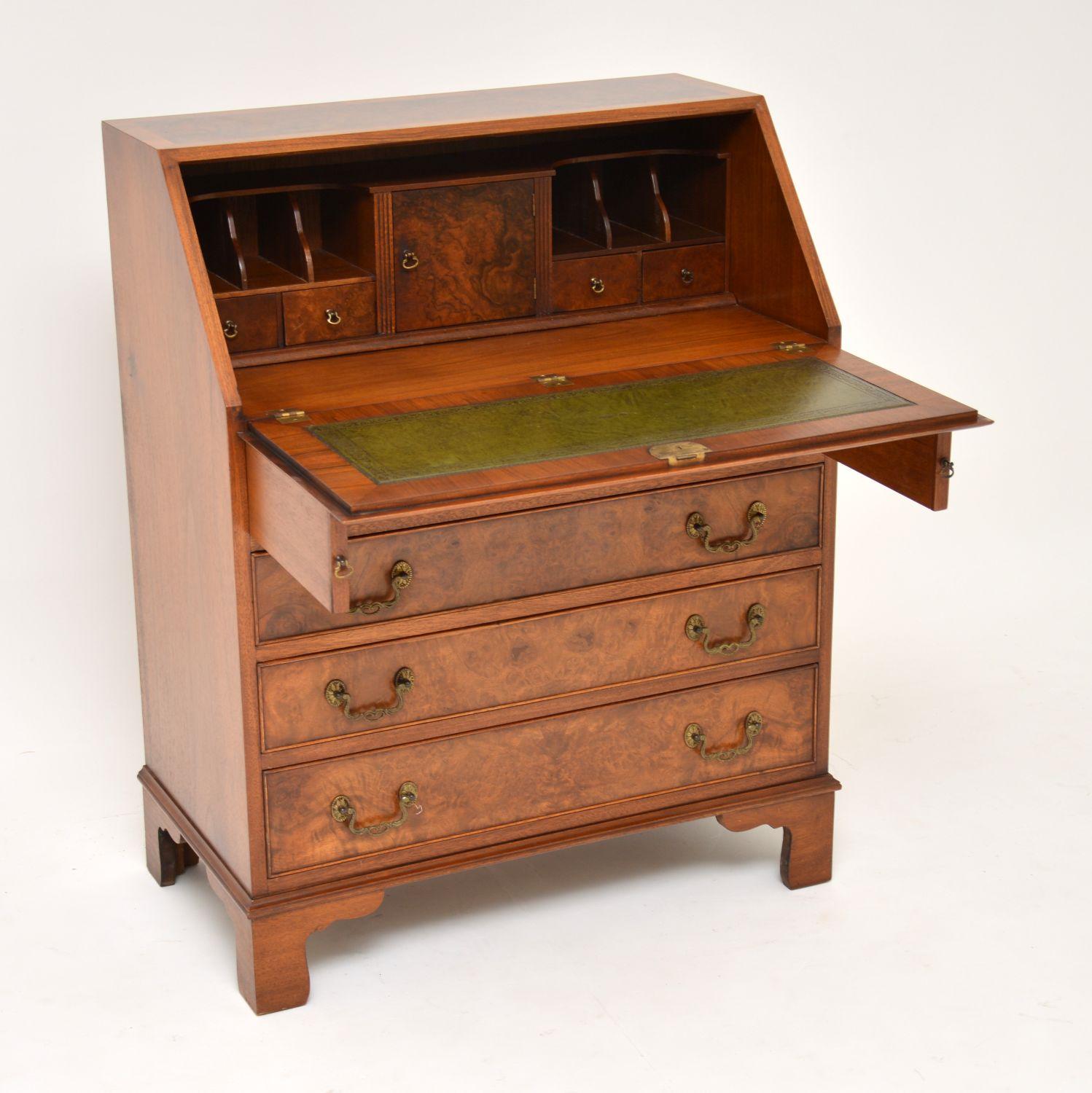 Antique George III style burr walnut bureau in very good original condition, dating to circa 1930s-1950s period. It has particularly nice figuring on the top which is crossbanded and down the front, plus it has a lovely mellow color. The drawers