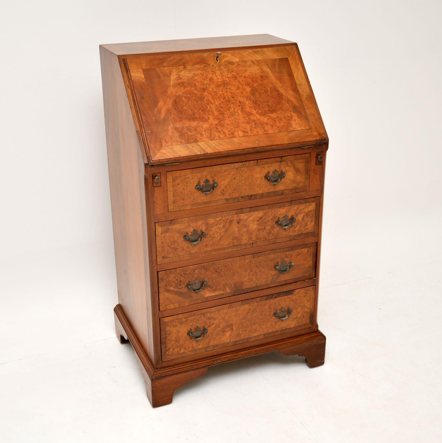 A smart and very useful antique writing bureau, beautifully made from burr walnut. This is in the antique Georgian style & dates from around 1900-1920’s

It’s of very high quality and is a great size. It is slim and doesn’t take up too much space,