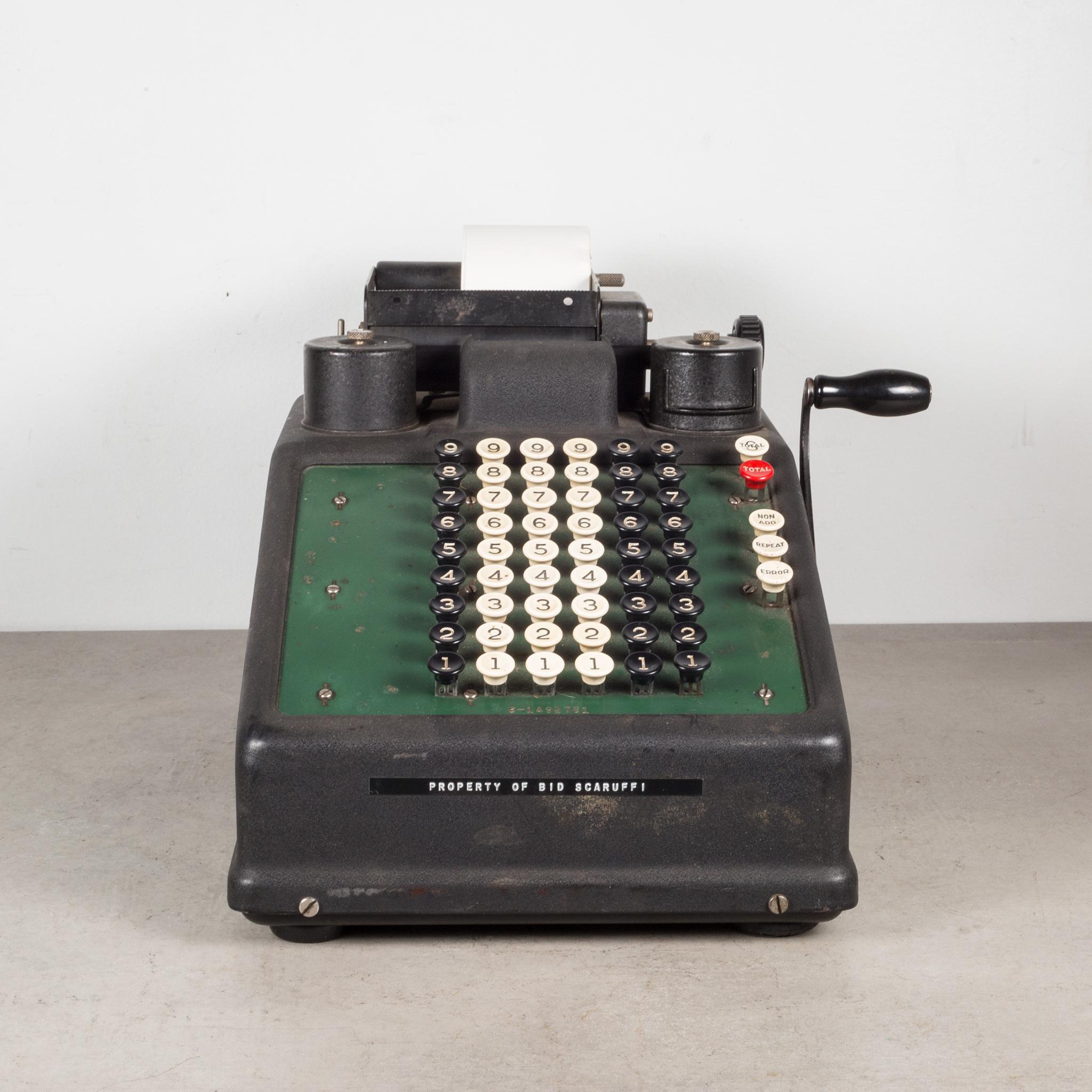 About

An antique metal figuring (adding) machine by Burrough's. The body is metal with Bakelite keys and wooden handle. The lever pulls forward and back working the inner mechanisms. The black, white and red push button numbers are Bakelite, the