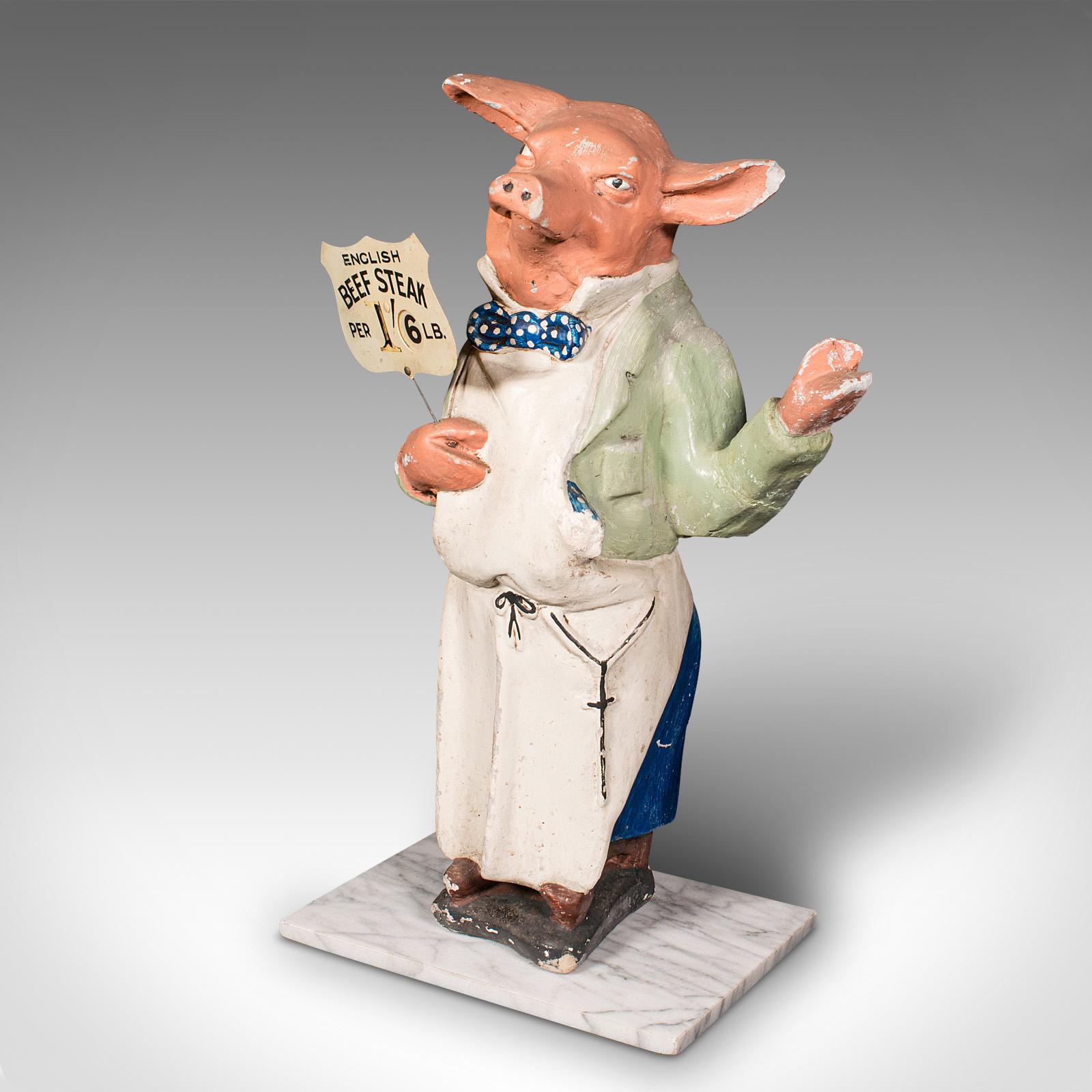 butchers pig statue