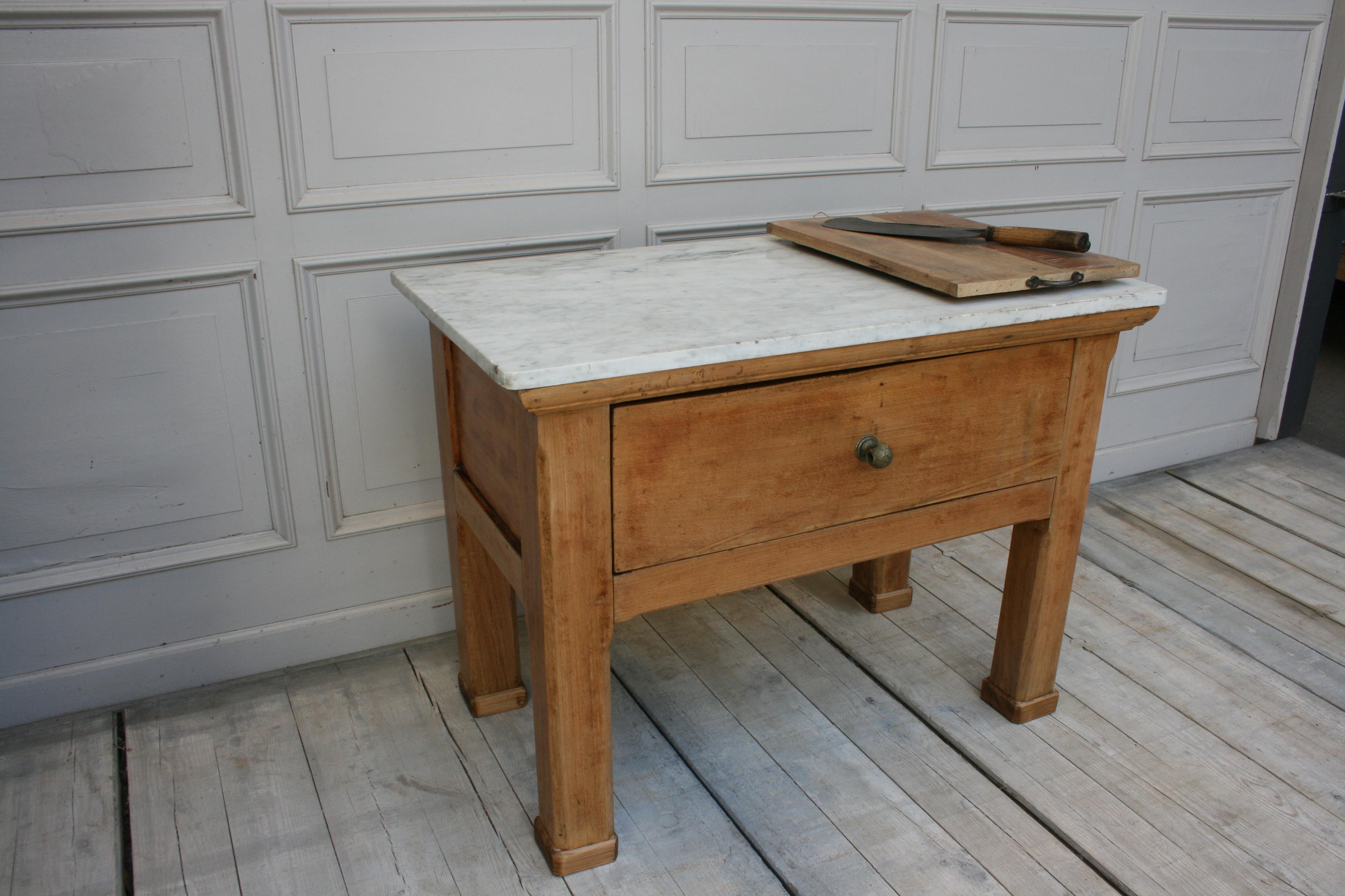 Original old butcher block frame (massive ash) from France with old marble top. Perfect for any kitchen, both in a modern style and in a French country style.

 