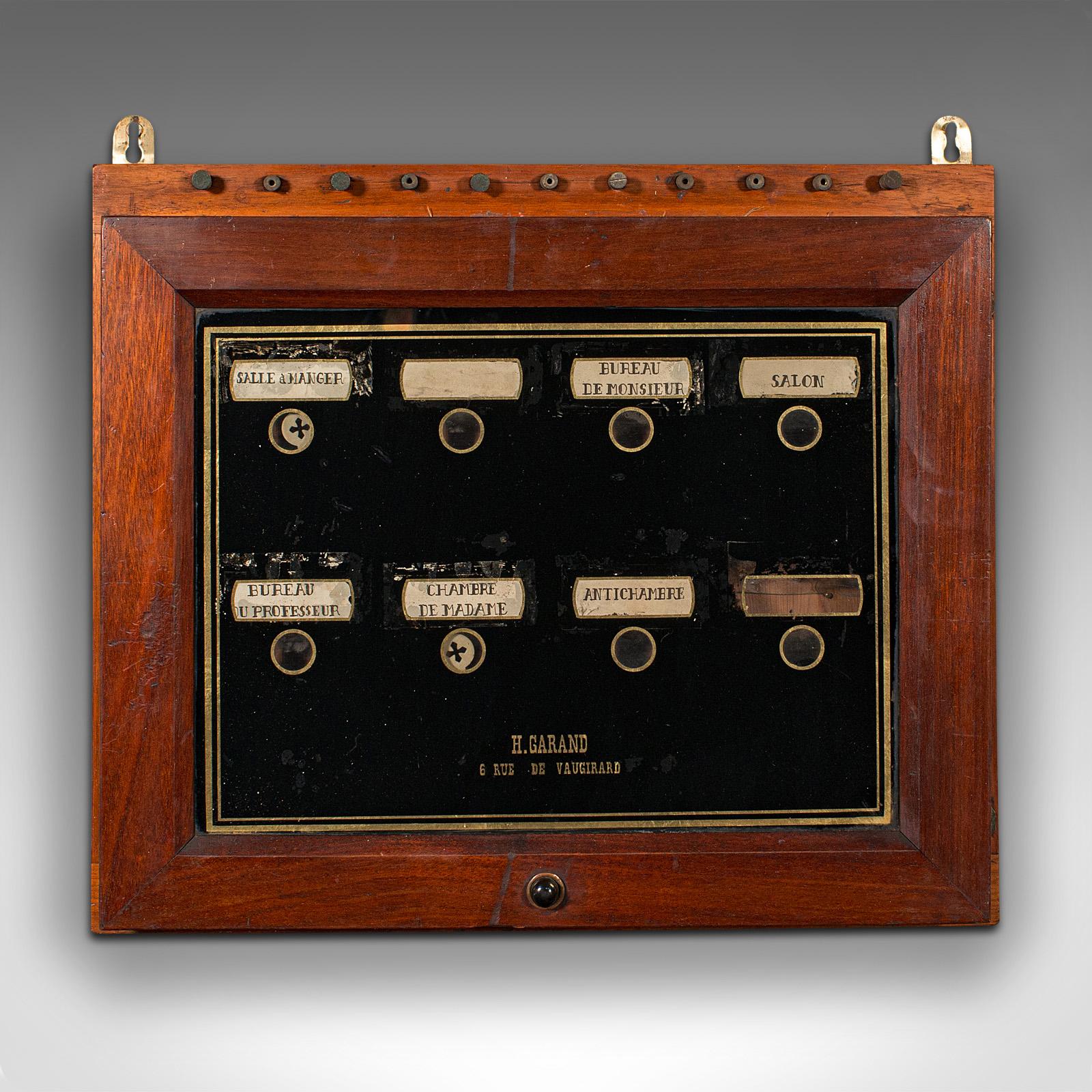 This is an antique butler's bell board. A French oak, pine and glass room alarm panel, dating to the late Victorian period, circa 1900.

Charming butler's alarm panel, with French collector's appeal
Displays a desirable aged patina and in good