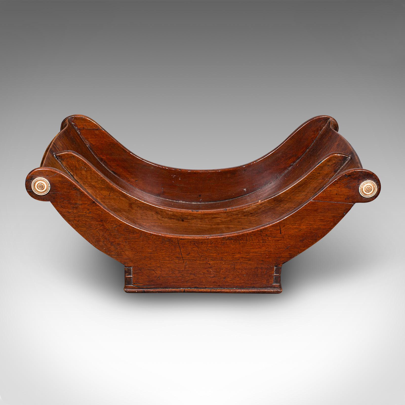This is an antique butler's Stilton serving stand. An English, mahogany cheese truckle crescent, dating to the Georgian period, circa 1780. An exquisite and unusual serving piece, rich in charm and form, ideal for the collector or as a distinctive