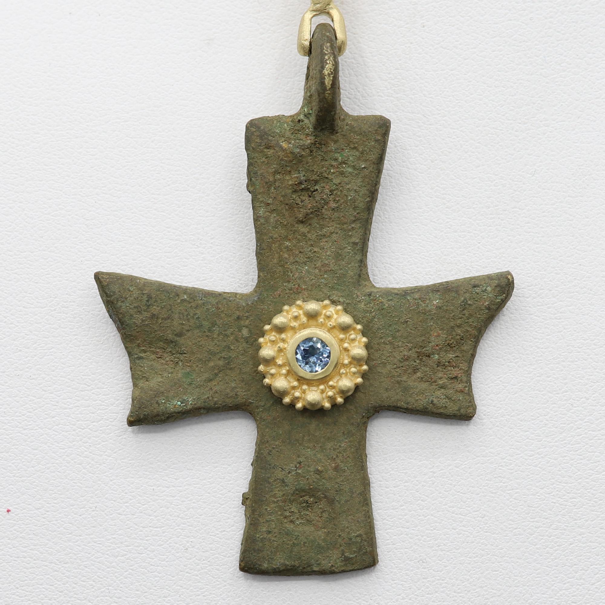 Magnificent piece of History - can be yours today !
Ancient Byzantine Period cross.
Hand set in Italy with 18k Yellow Gold & Blue Aquamarine.
Approx size 2' inch / 50 mm.
This Antique Bronze Cross is estimated from 600-900 AD 
Included 16' - 18'