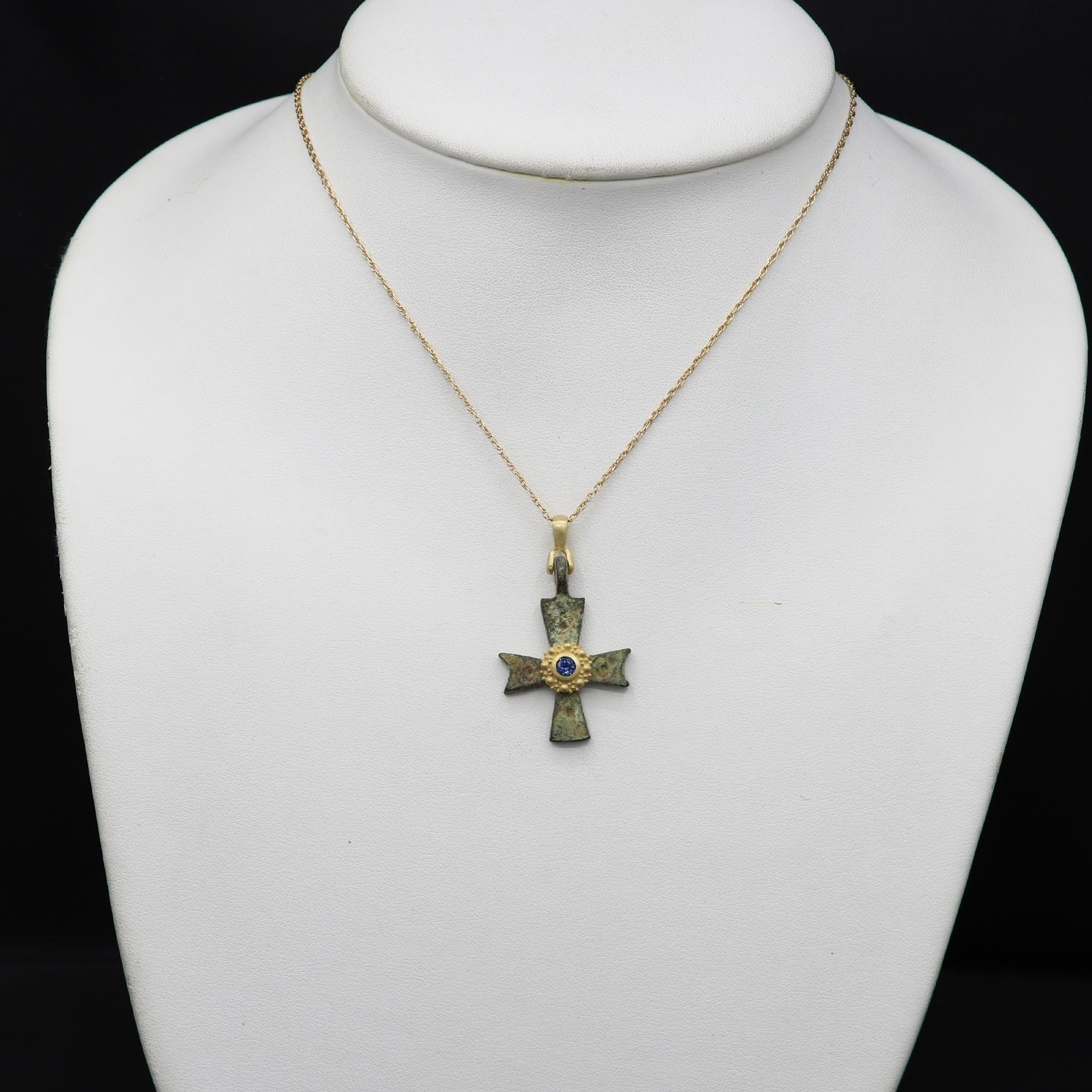 Magnificent piece of History - can be yours today !
Ancient Byzantine Period cross.
Hand set in Italy with 18k Yellow Gold & Blue Sapphire.
Approx size 1' inch / 25 mm.
This Antique Bronze Cross is estimated from 600-900 AD 
Included 16' - 18' Inch