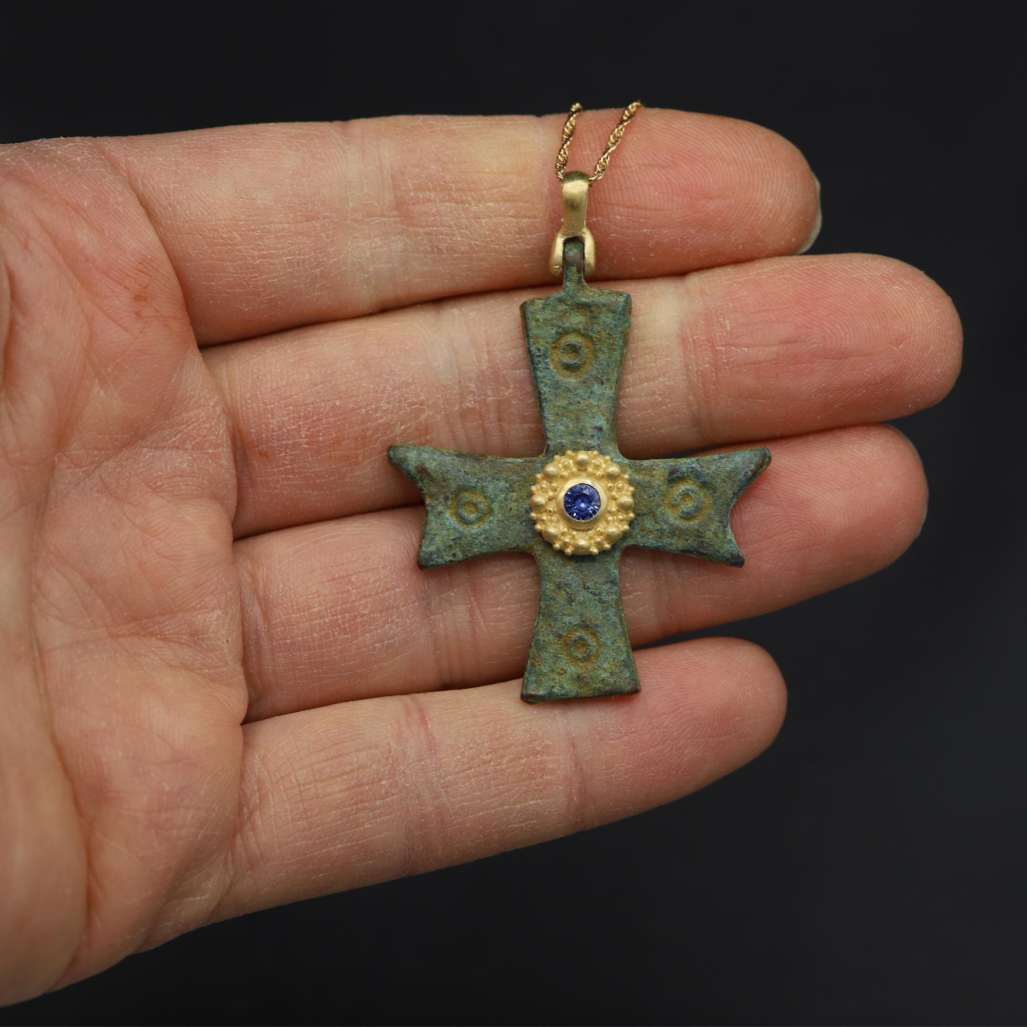Magnificent piece of History - can be yours today !
Ancient Byzantine Period cross.
Hand set in Italy with 18k Yellow Gold & Blue Sapphire.
Approx size 1.75' inch / 40 mm.
This Antique Bronze Cross is estimated from 600-900 AD 
Included 16' - 18'