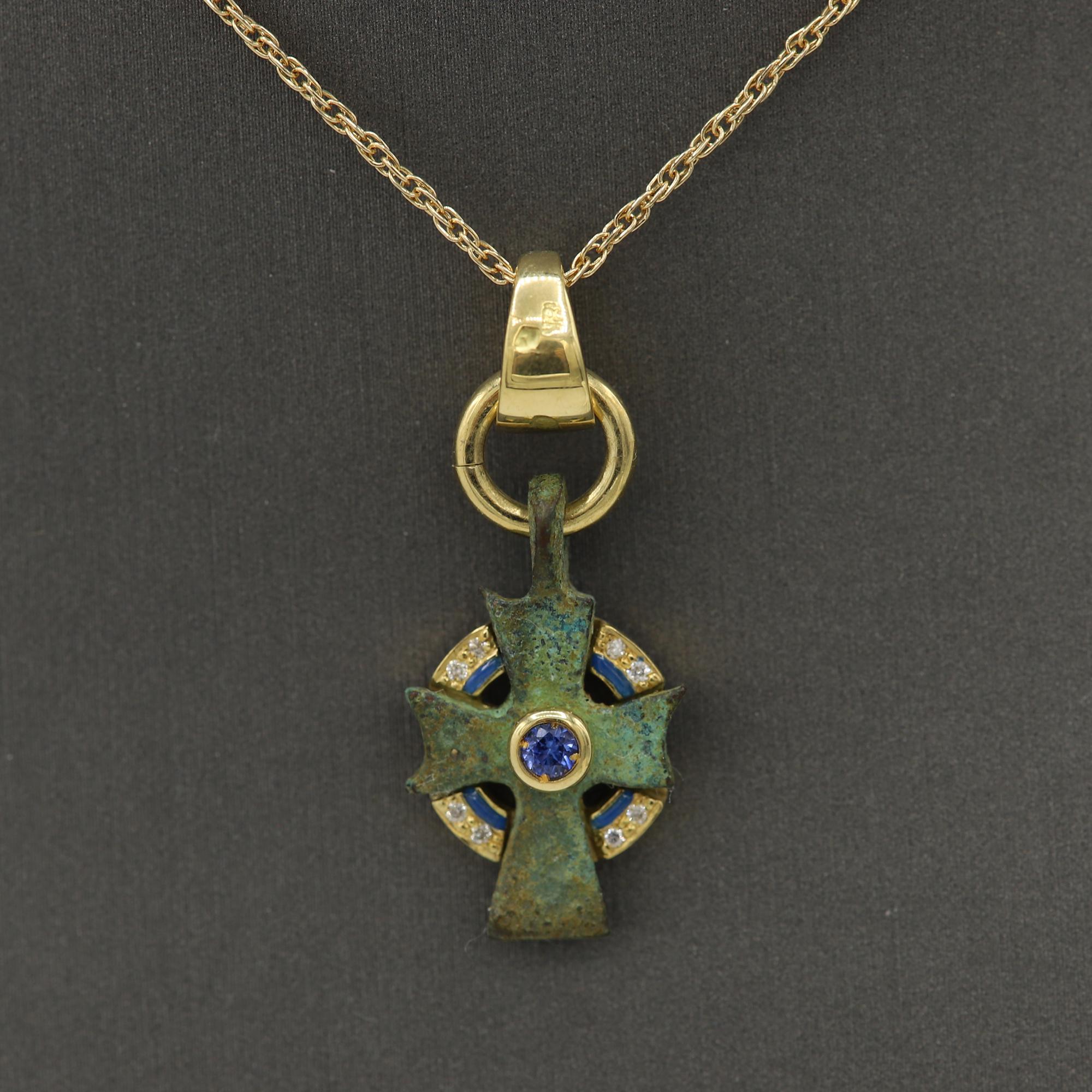 Magnificent piece of History - can be yours today !
Ancient Byzantine Period cross.
Hand set in Spain with 18k Yellow Gold.
Approx size 3/4' inch or 20 mm.
With a center Blue Sapphire and a little bit enamel.
some Diamonds too.
this Antique Bronze